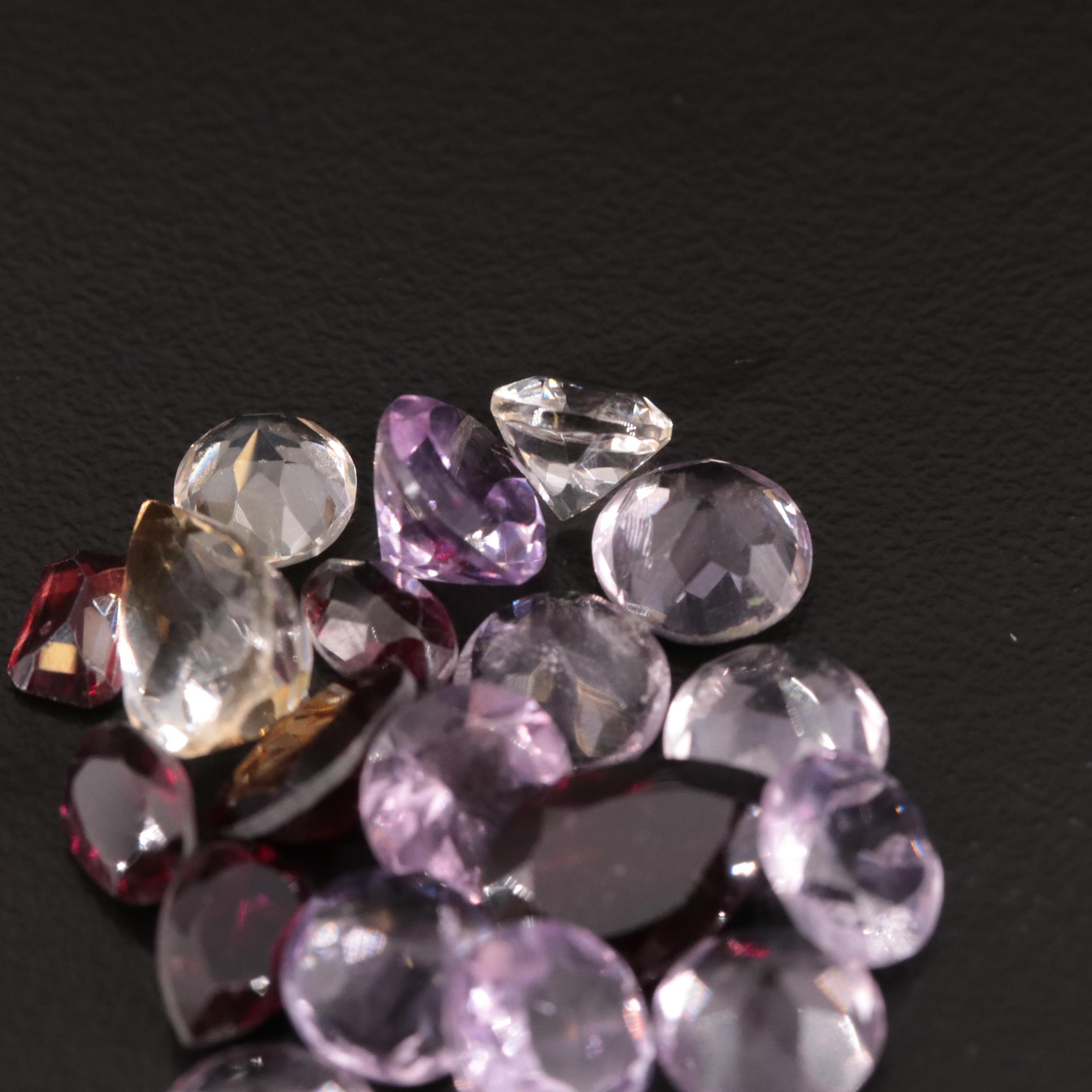 Loose 21.52 CTW Amethyst, Citrine, and Garnet Lot