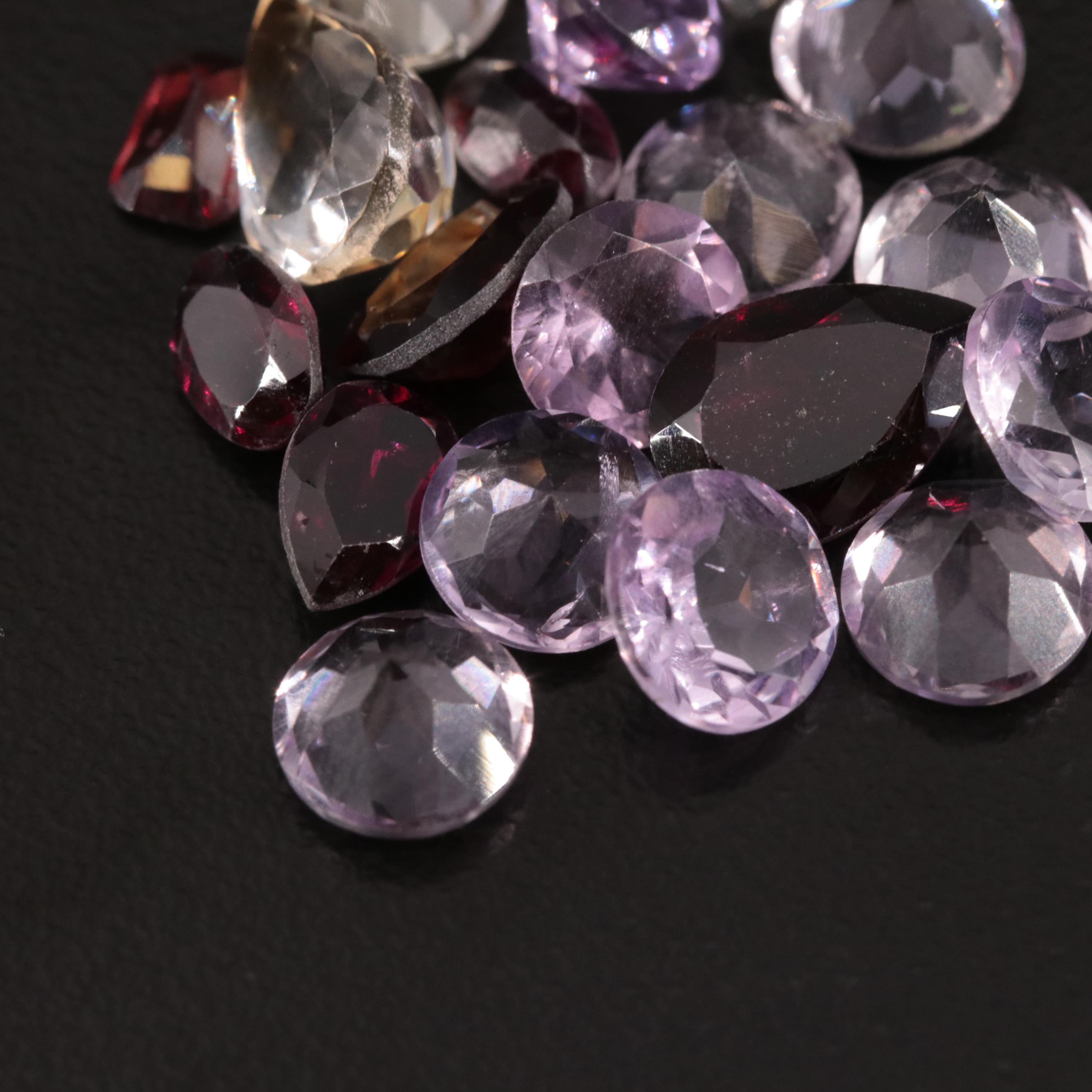 Loose 21.52 CTW Amethyst, Citrine, and Garnet Lot