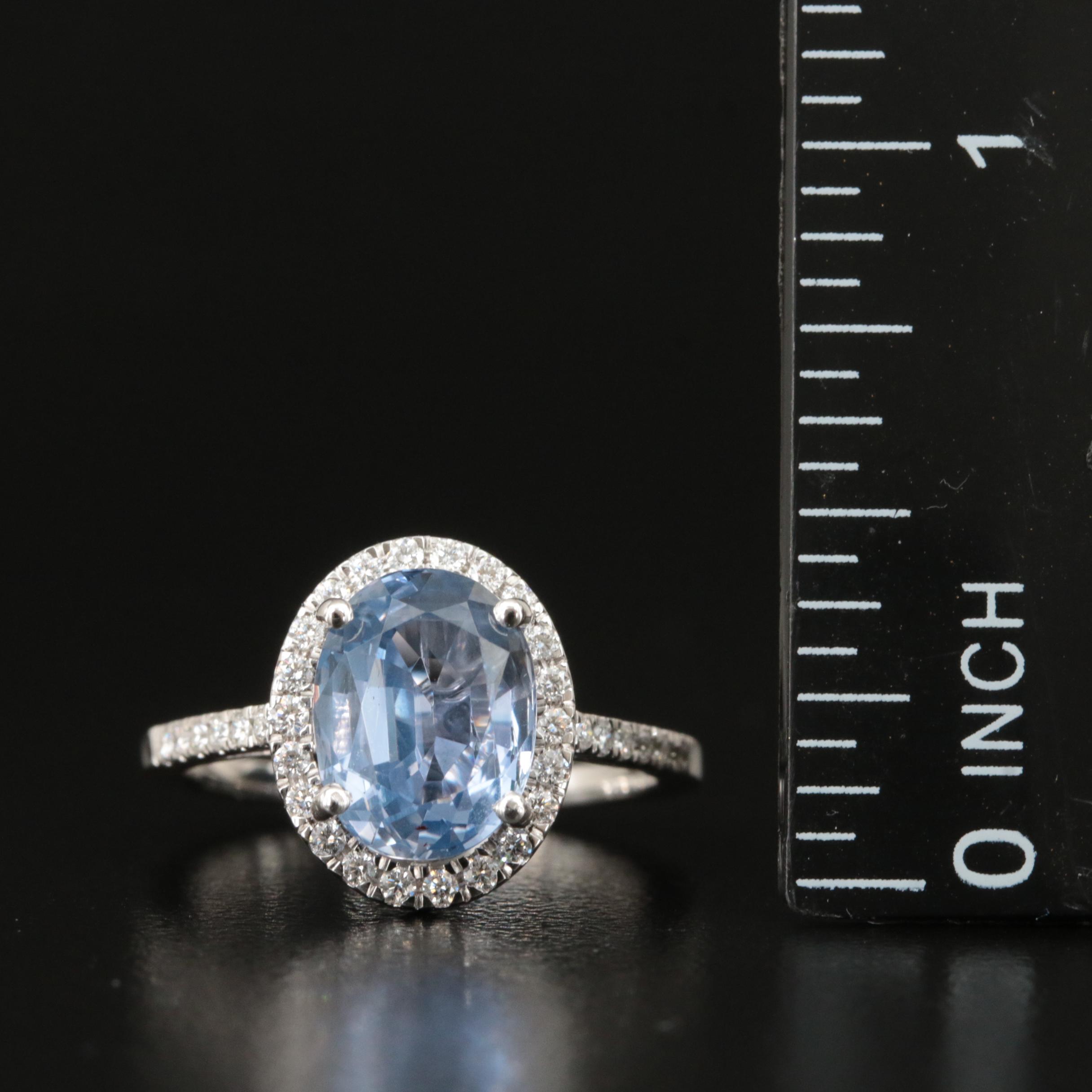 18K 3.45 CT Sapphire and Diamond Halo Ring