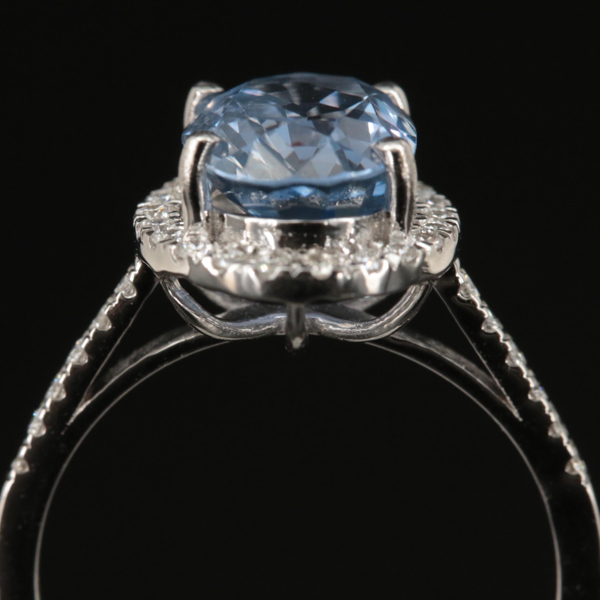 18K 3.45 CT Sapphire and Diamond Halo Ring