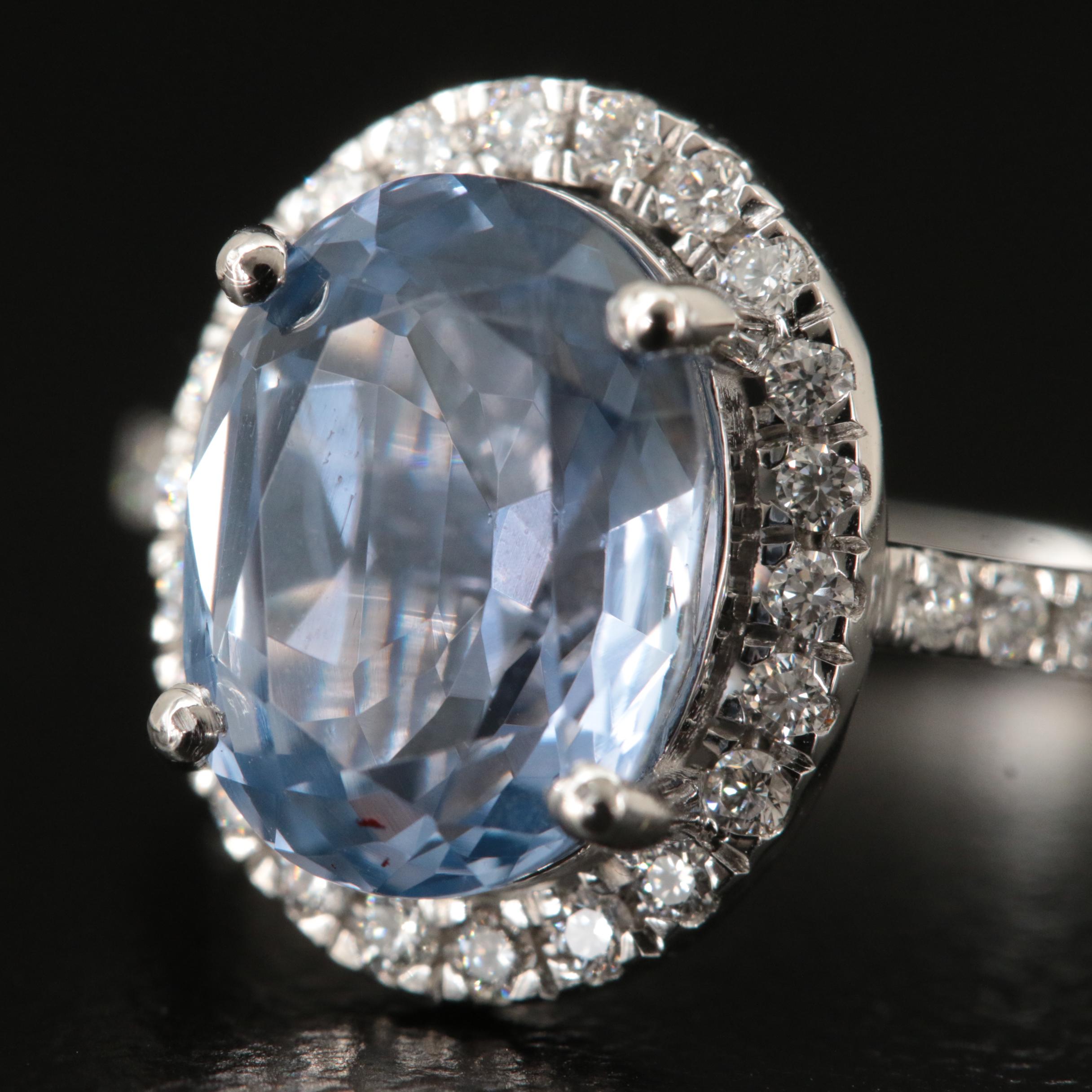 18K 3.45 CT Sapphire and Diamond Halo Ring