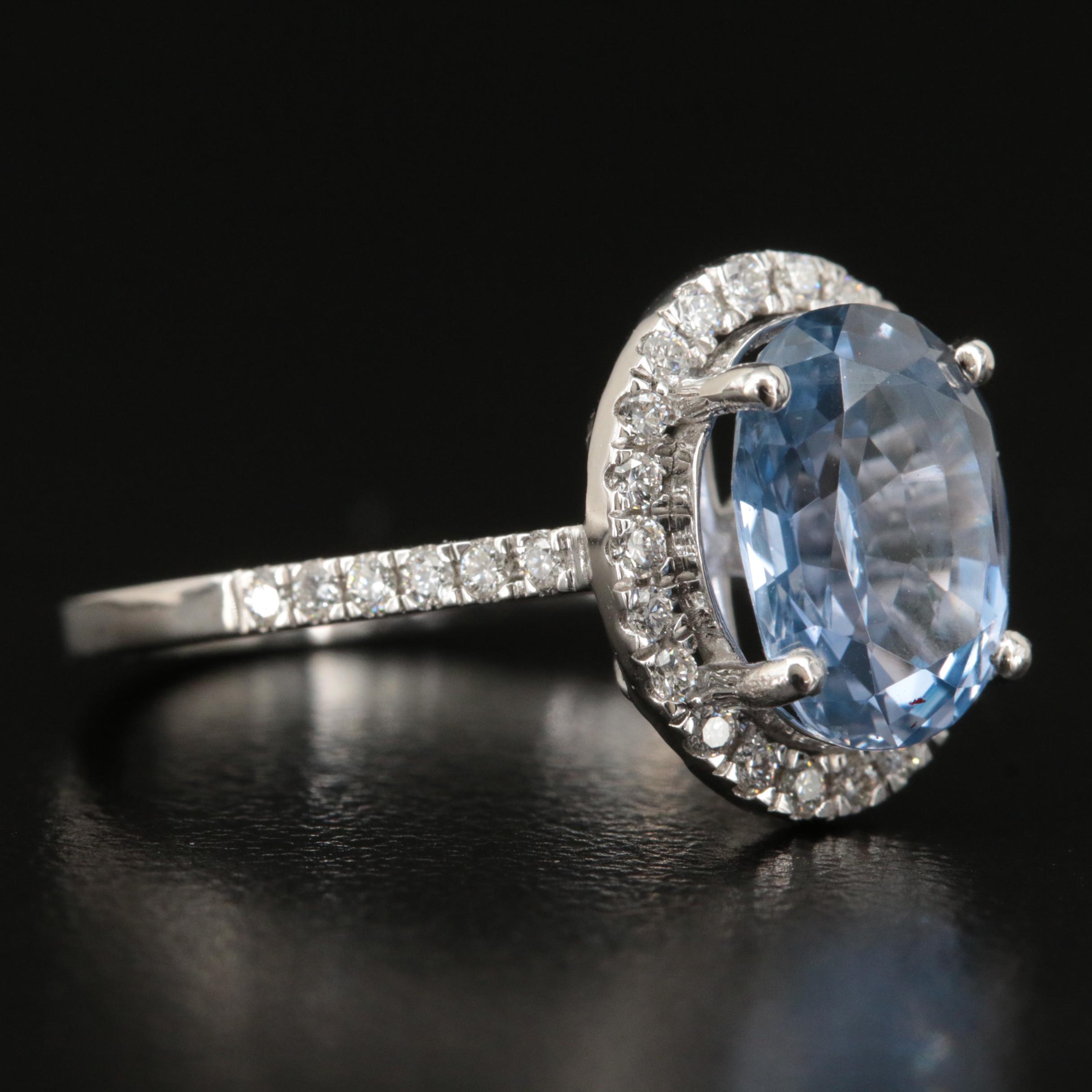 18K 3.45 CT Sapphire and Diamond Halo Ring