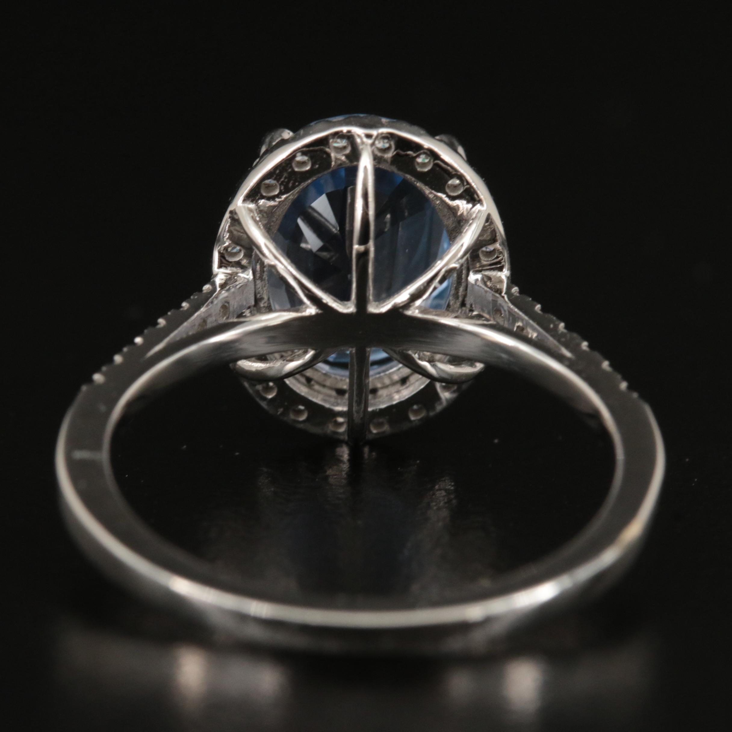 18K 3.45 CT Sapphire and Diamond Halo Ring