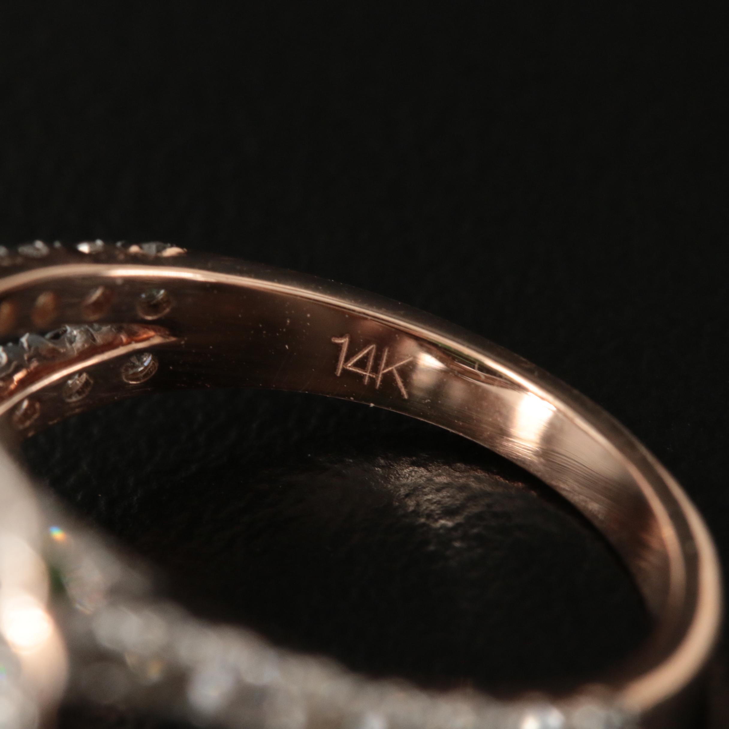 14K Rose Gold 8.29 Emerald and 1.50 CTW Halo Ring