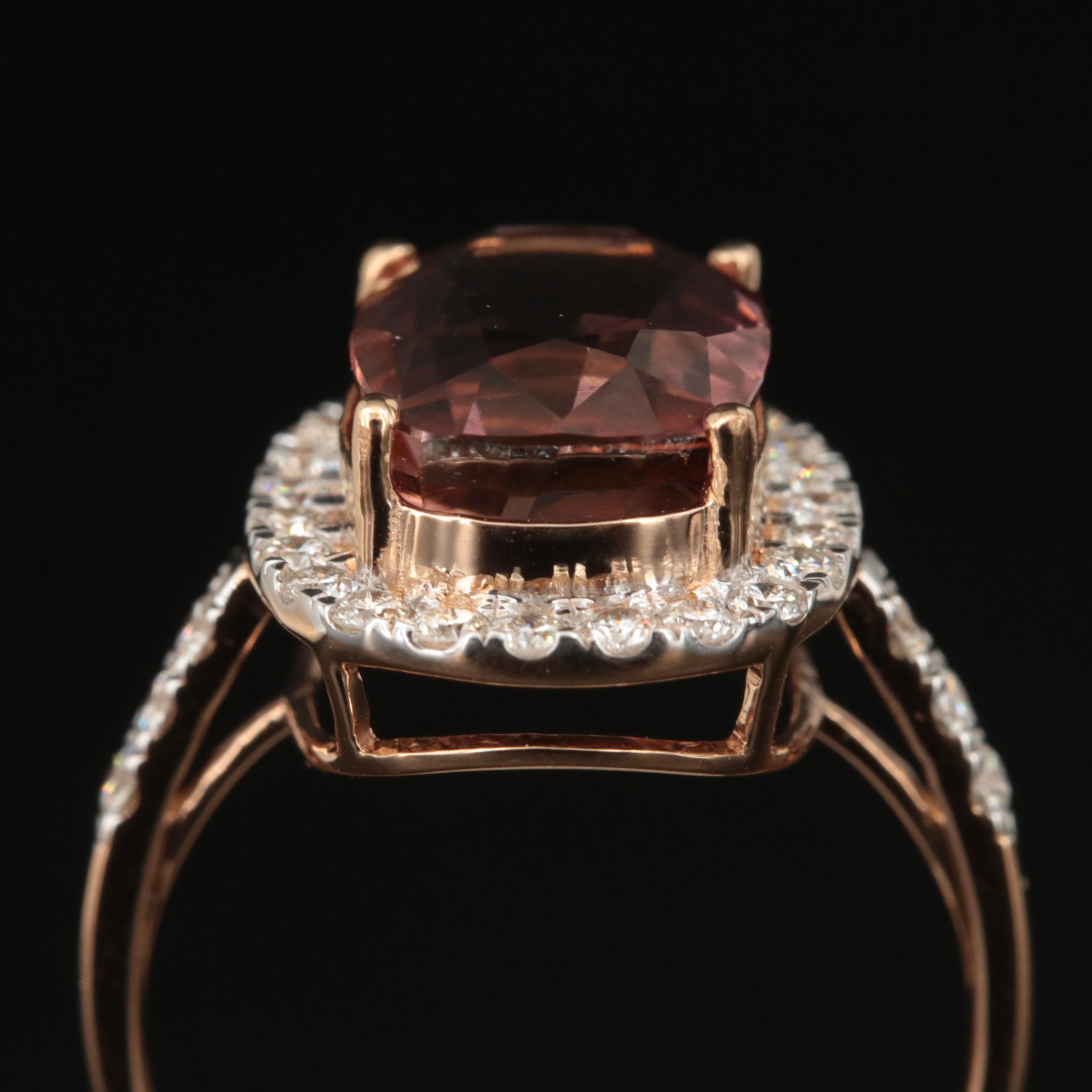 18K 4.38 CT Tourmaline and Diamond Halo Ring