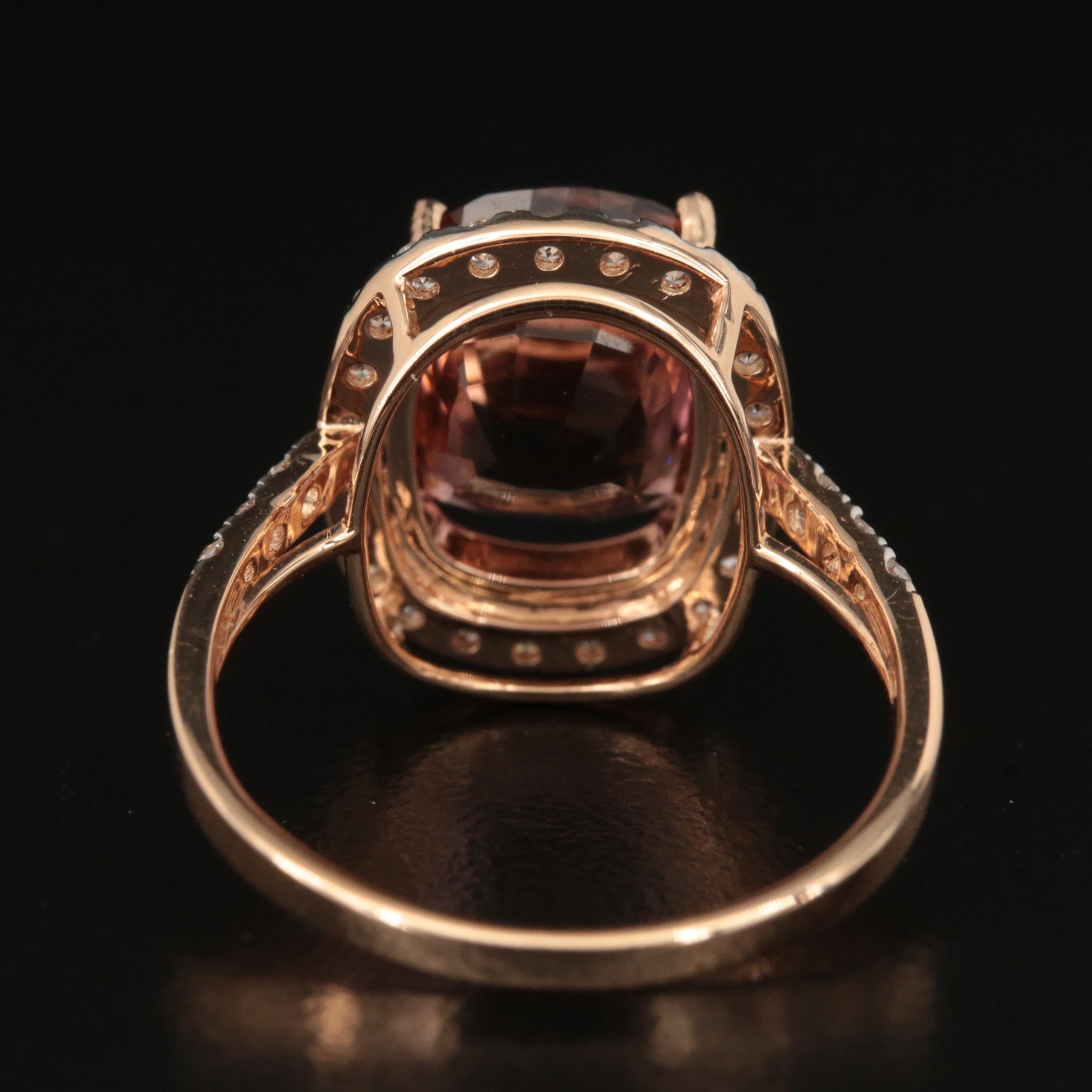 18K 4.38 CT Tourmaline and Diamond Halo Ring