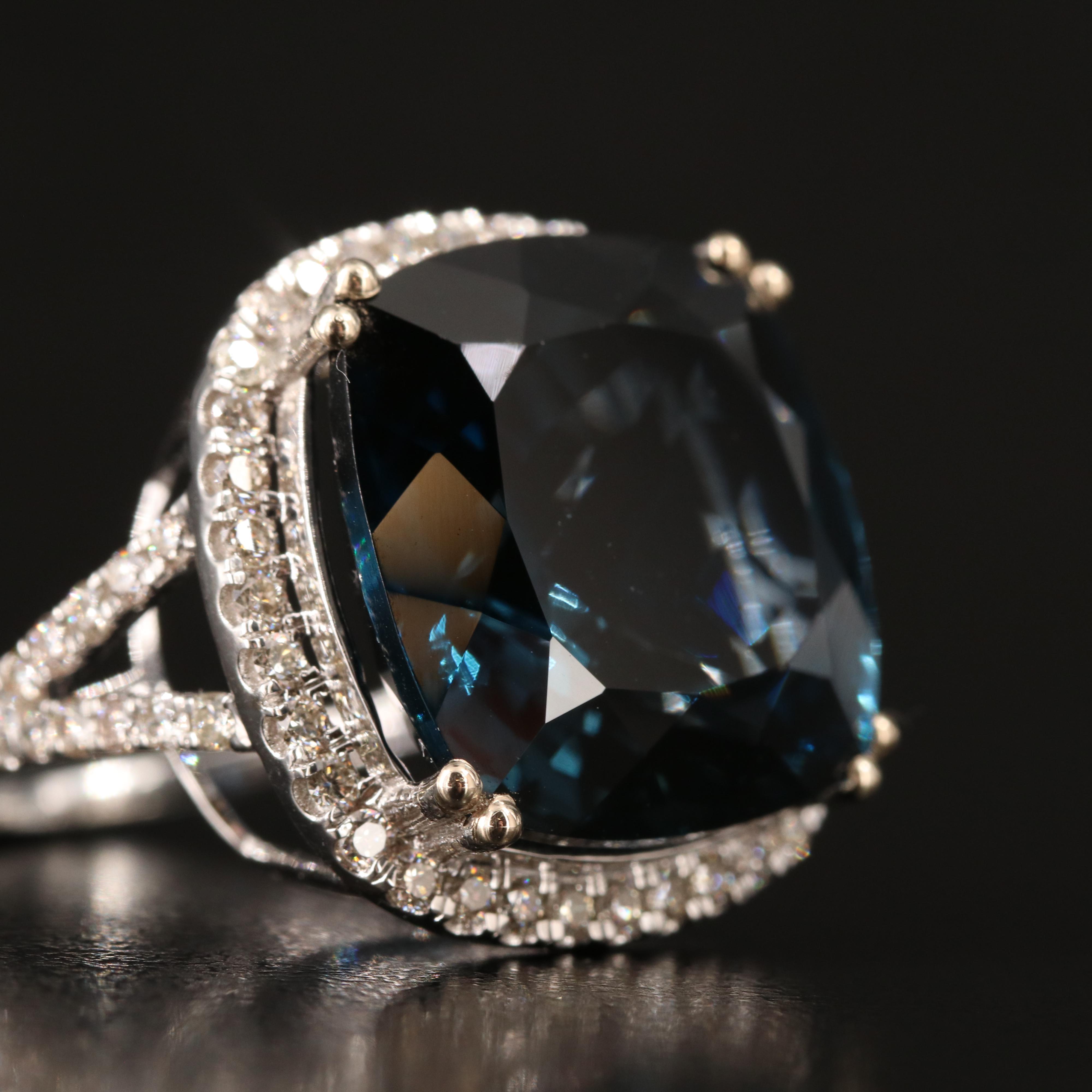 14K 23.88 CT London Blue Topaz and 1.06 CTW Diamond Ring