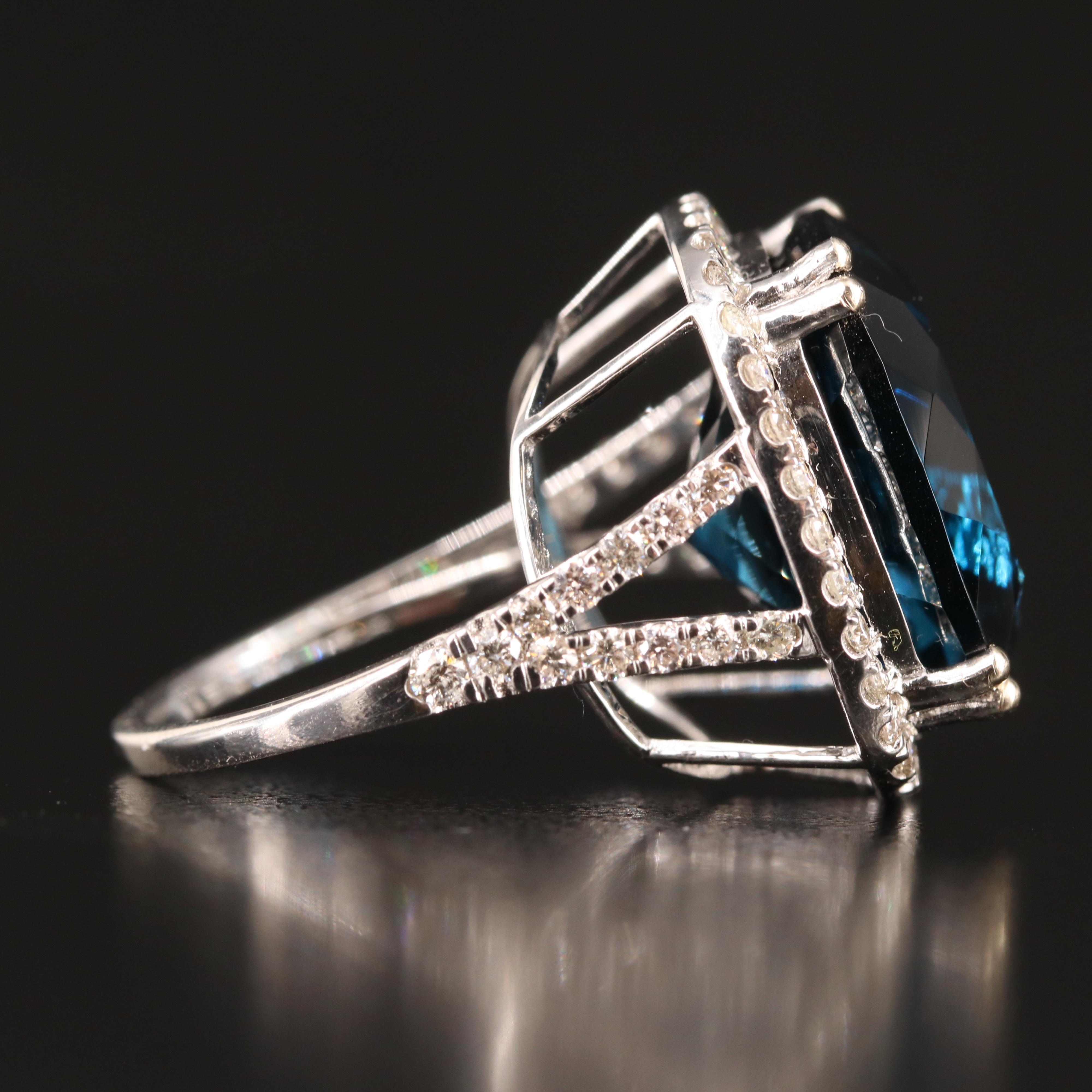 14K 23.88 CT London Blue Topaz and 1.06 CTW Diamond Ring