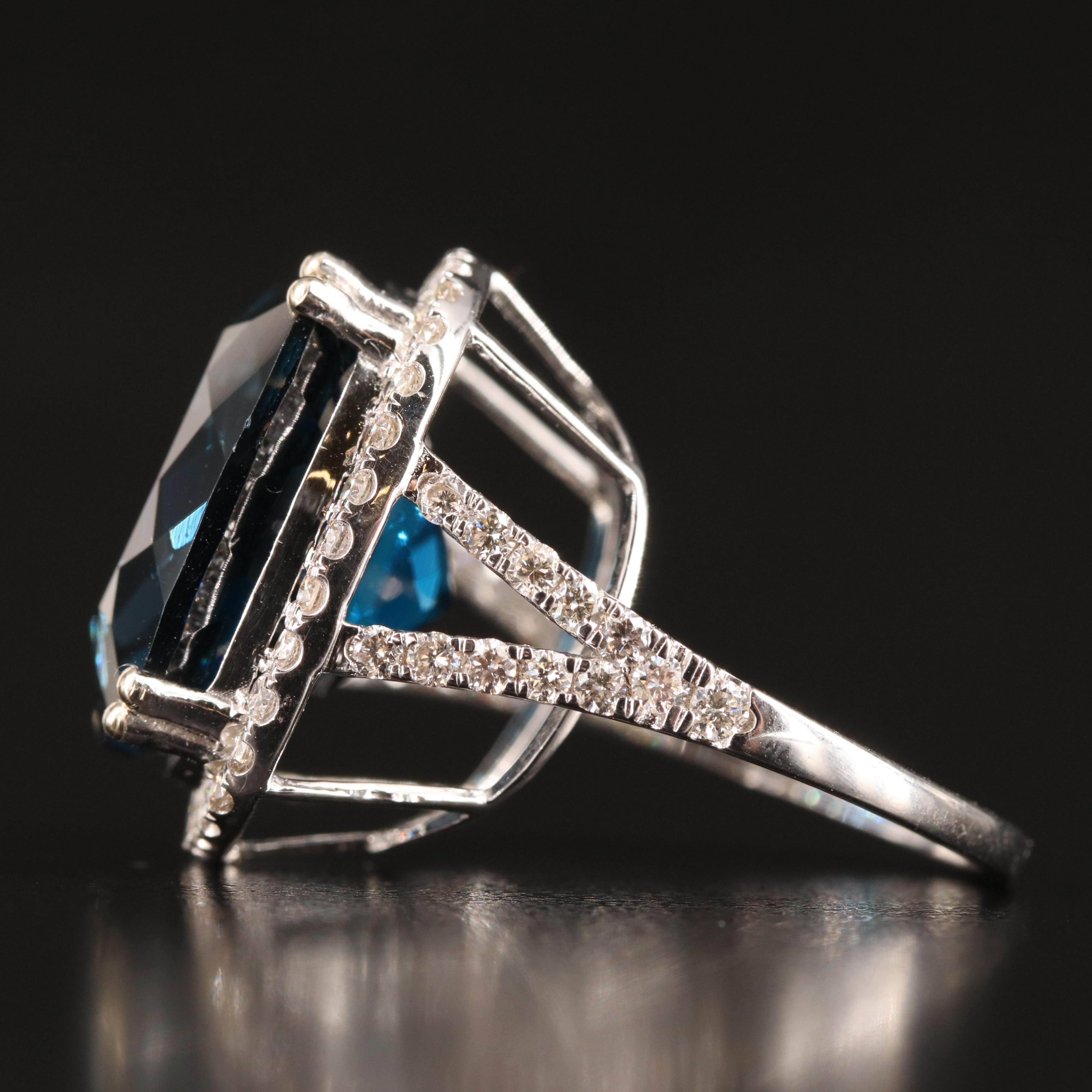 14K 23.88 CT London Blue Topaz and 1.06 CTW Diamond Ring