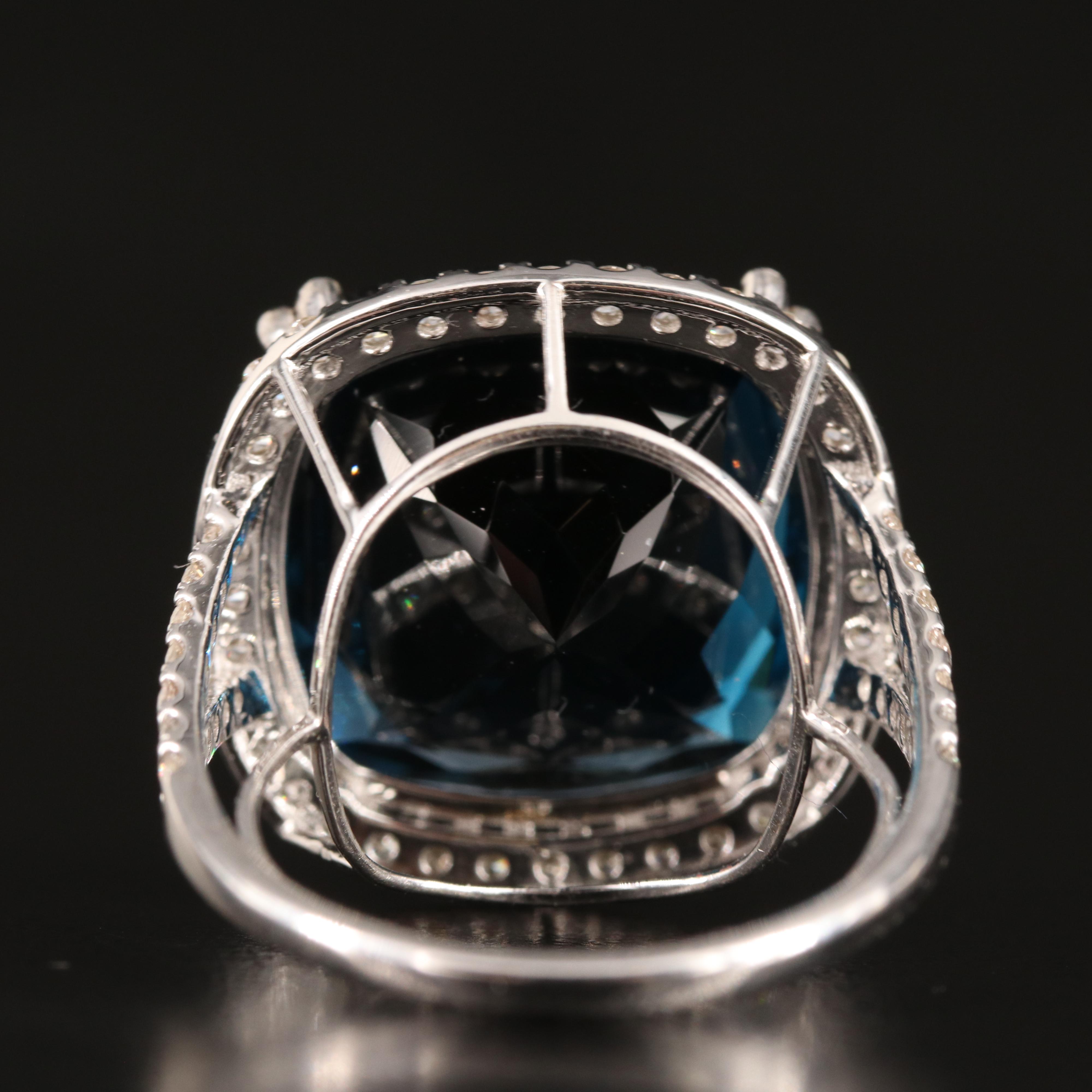 14K 23.88 CT London Blue Topaz and 1.06 CTW Diamond Ring