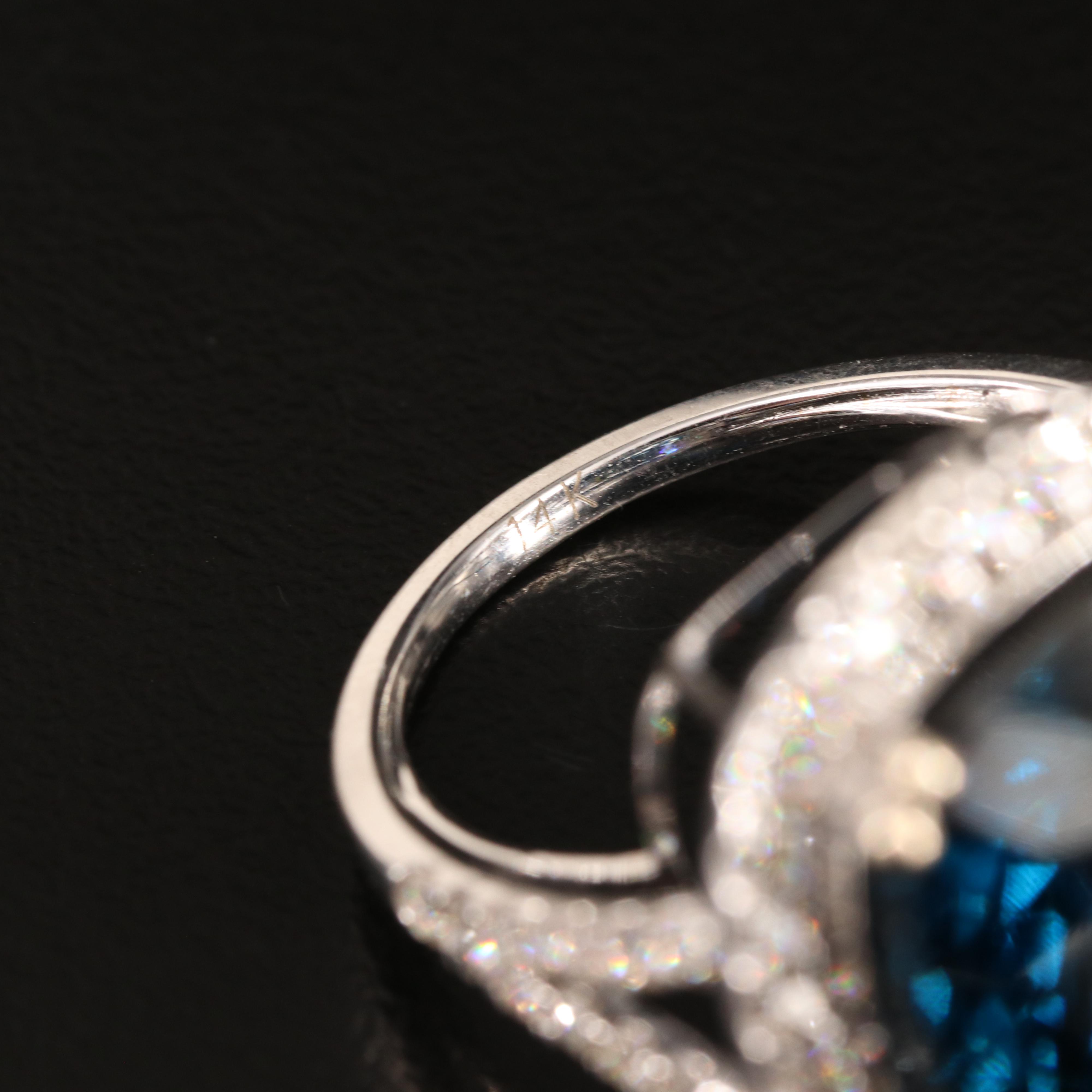 14K 23.88 CT London Blue Topaz and 1.06 CTW Diamond Ring