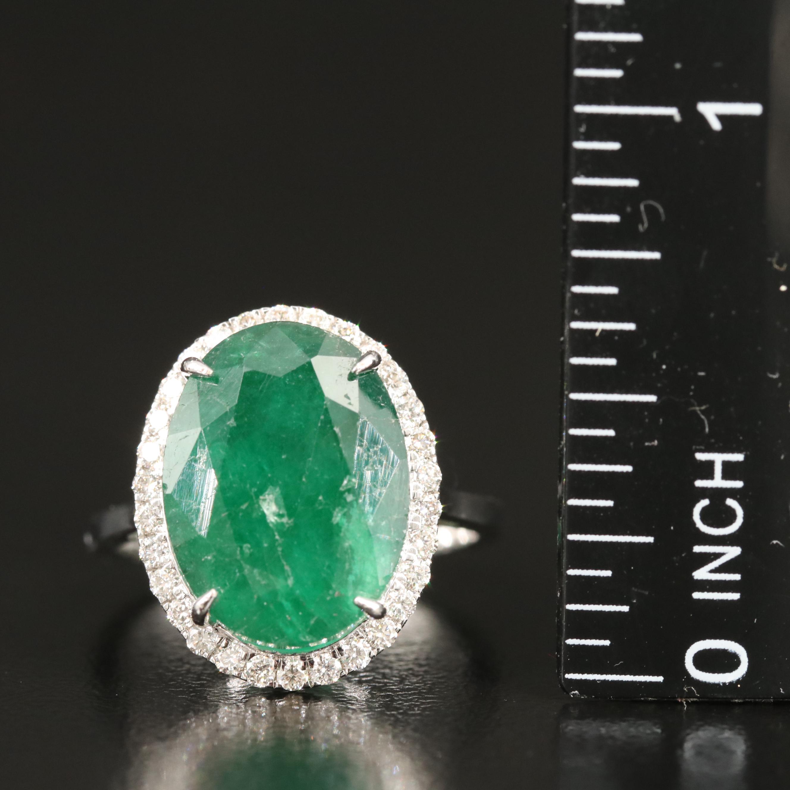 18K 6.42 CT Emerald and Diamond Halo Ring