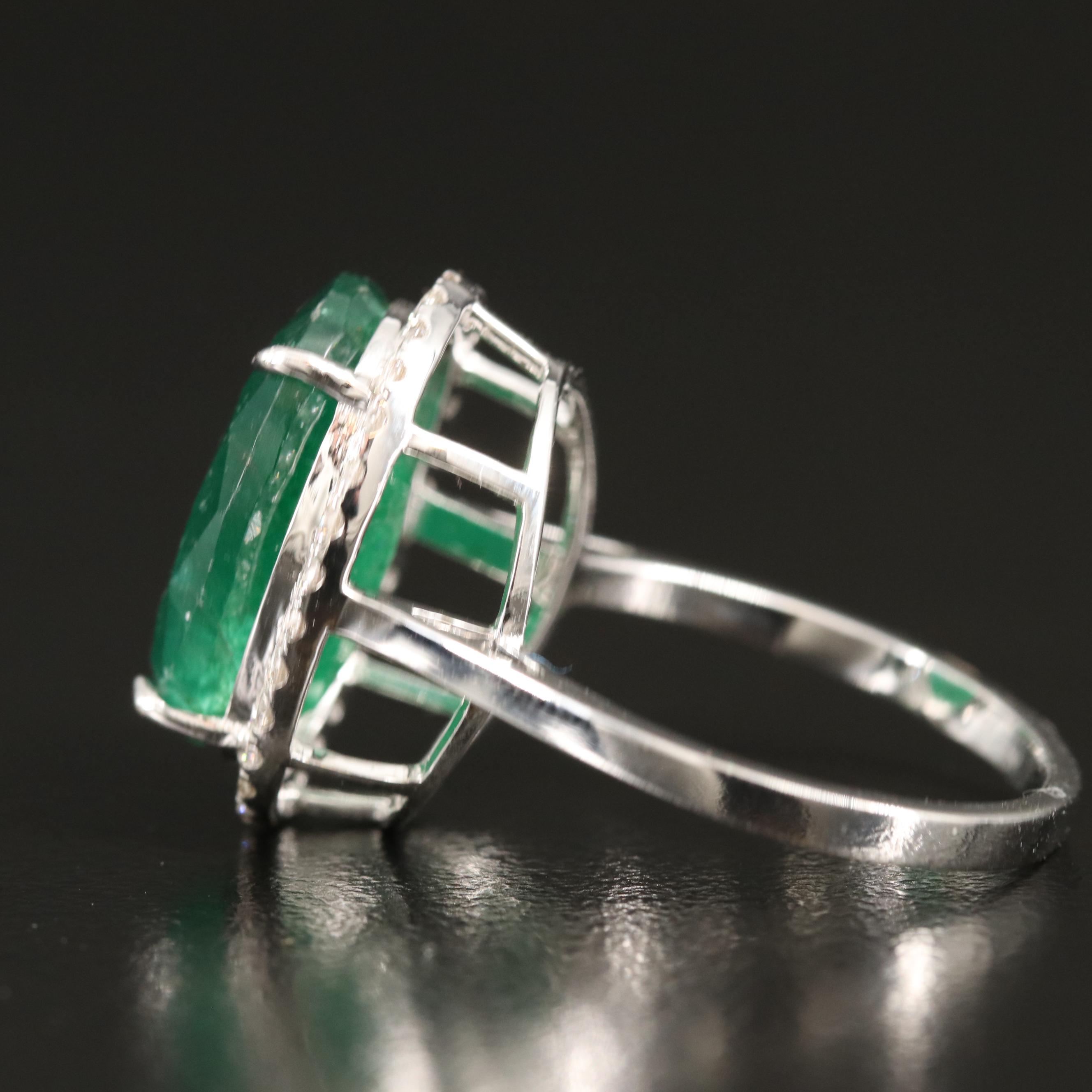 18K 6.42 CT Emerald and Diamond Halo Ring