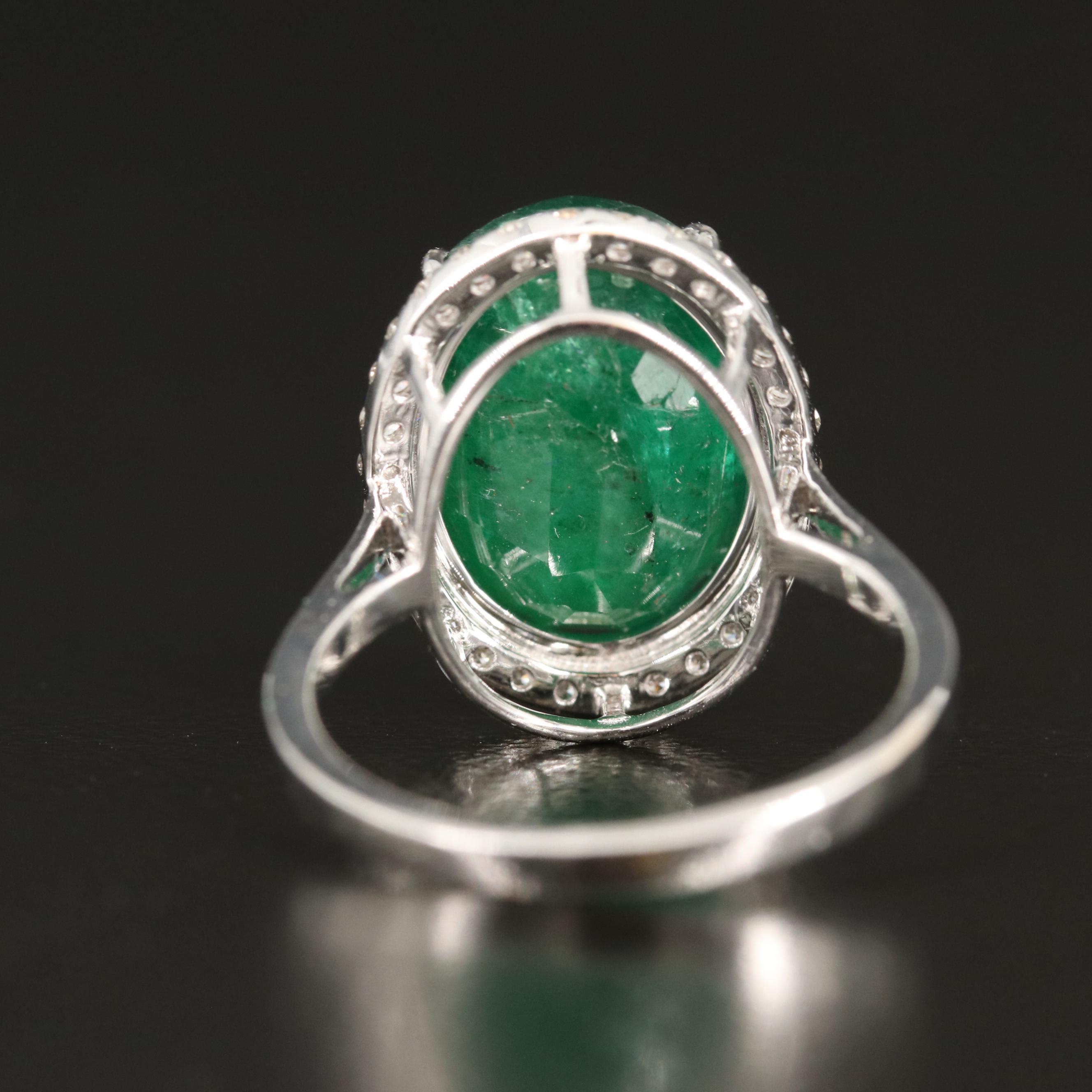 18K 6.42 CT Emerald and Diamond Halo Ring