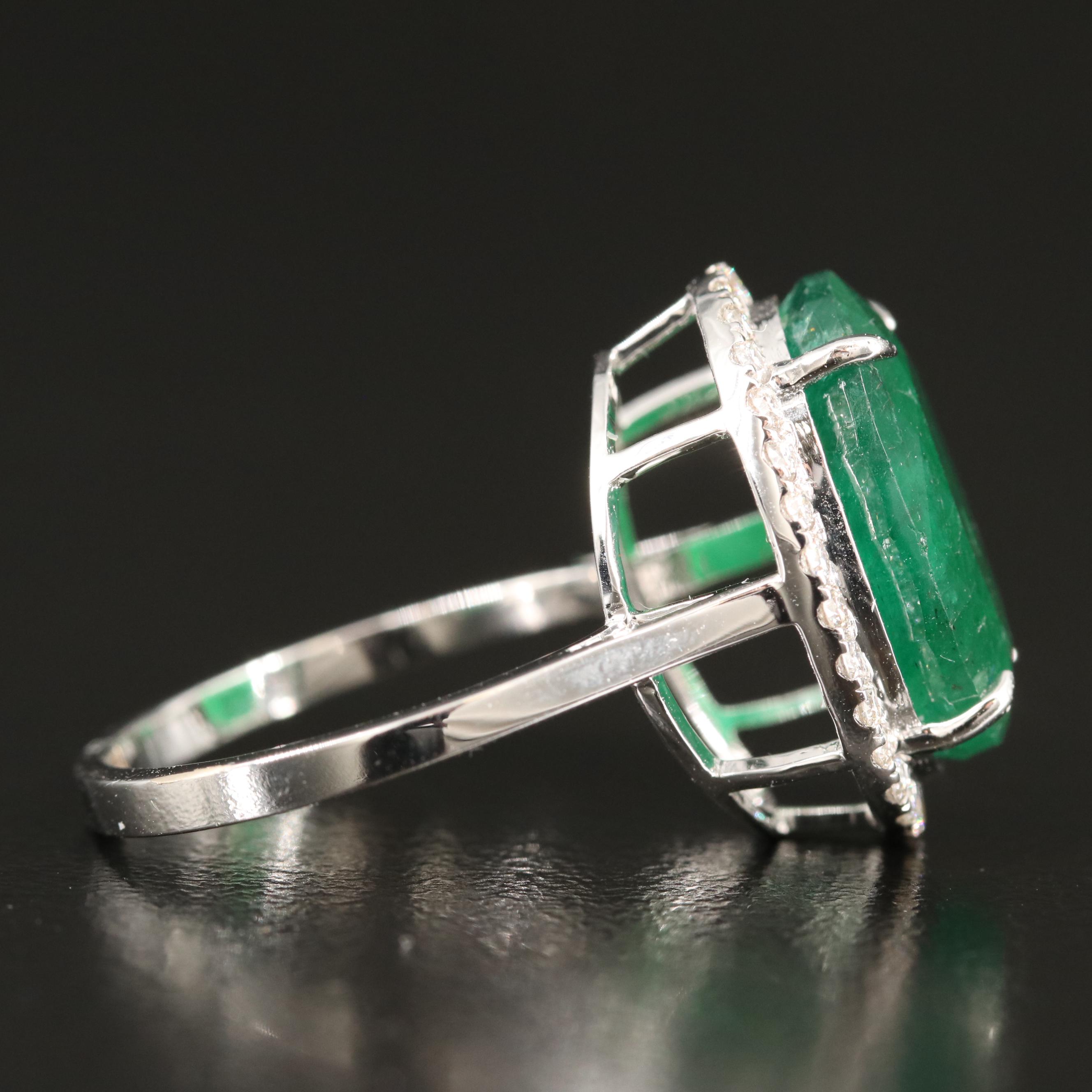 18K 6.42 CT Emerald and Diamond Halo Ring