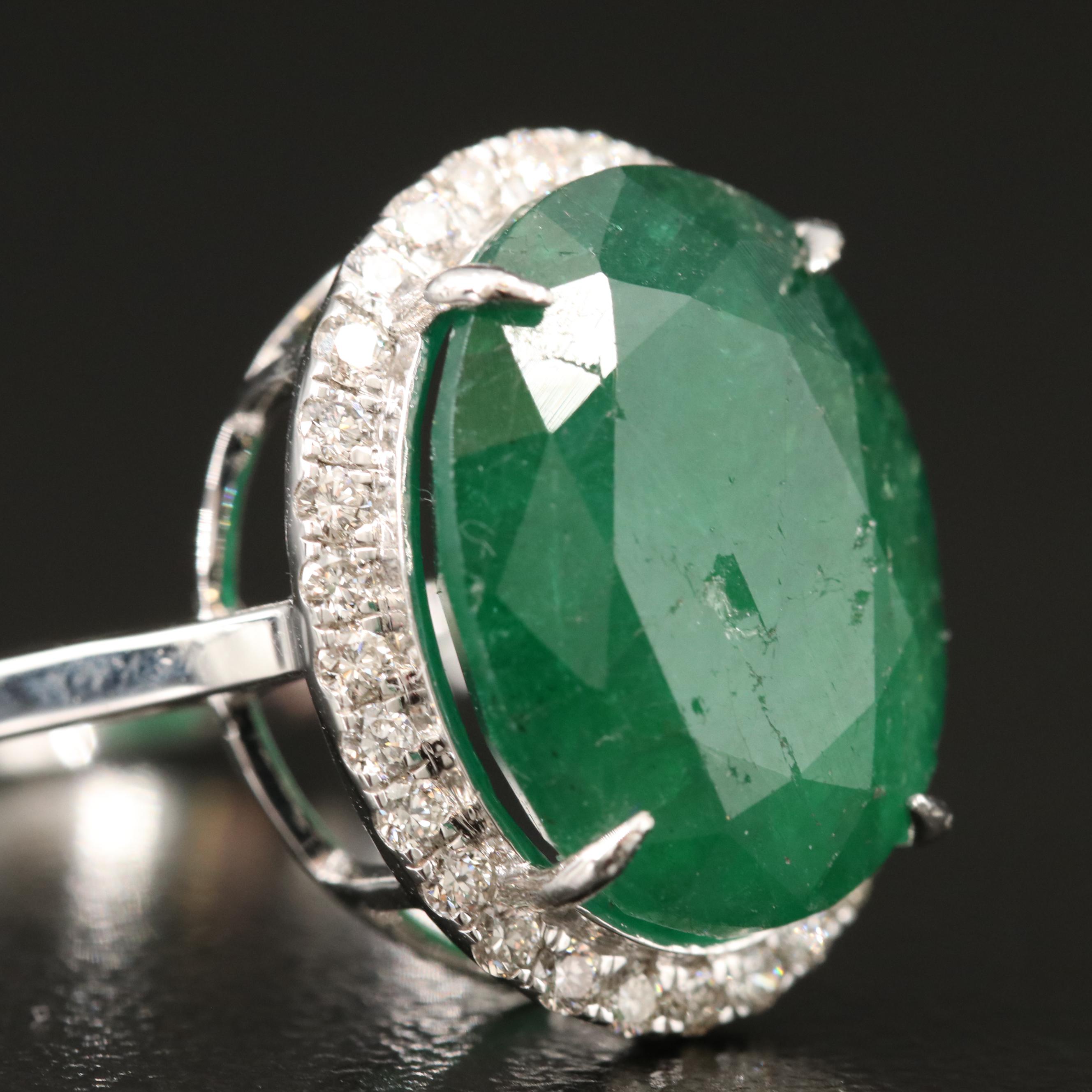 18K 6.42 CT Emerald and Diamond Halo Ring