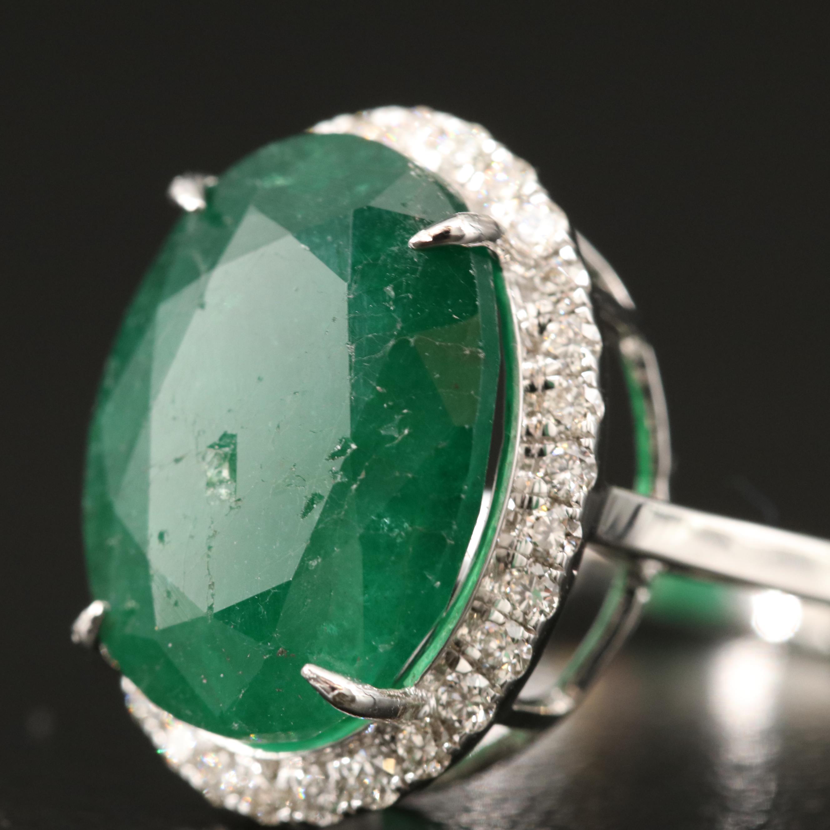 18K 6.42 CT Emerald and Diamond Halo Ring
