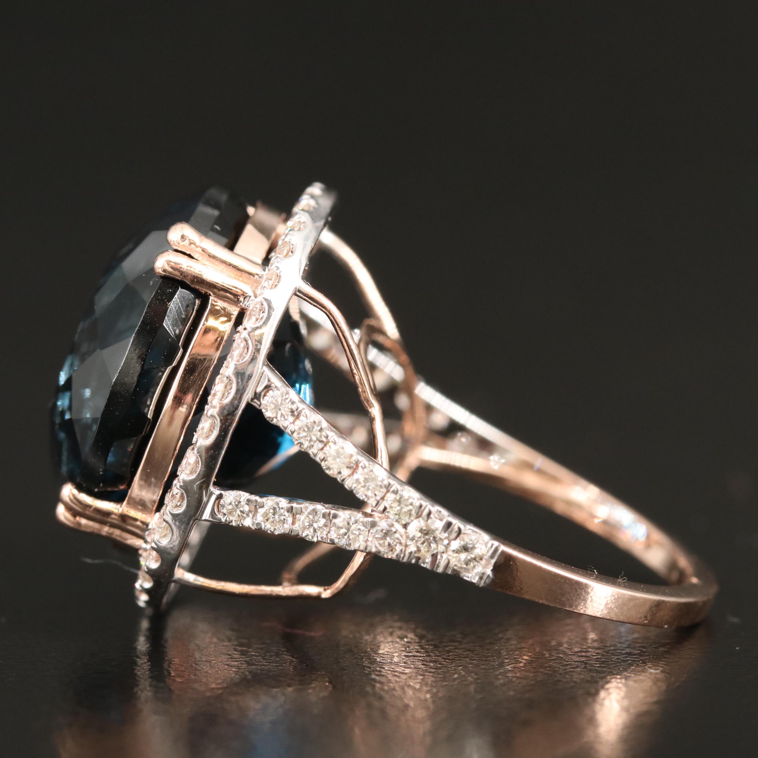 14K 26.70 CT London Blue Topaz and 1.05 CTW Diamond Cathedral Set Ring