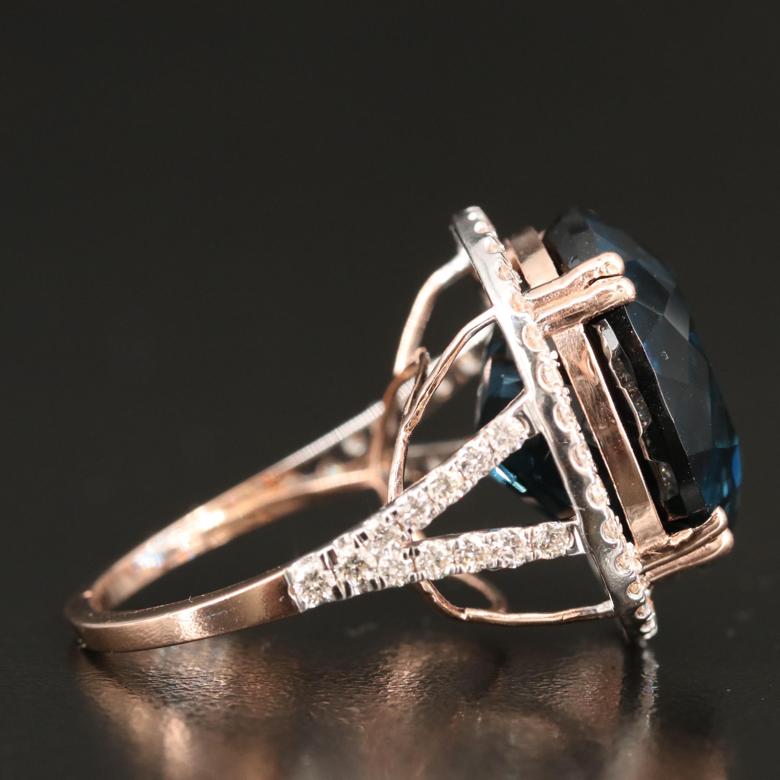 14K 26.70 CT London Blue Topaz and 1.05 CTW Diamond Cathedral Set Ring