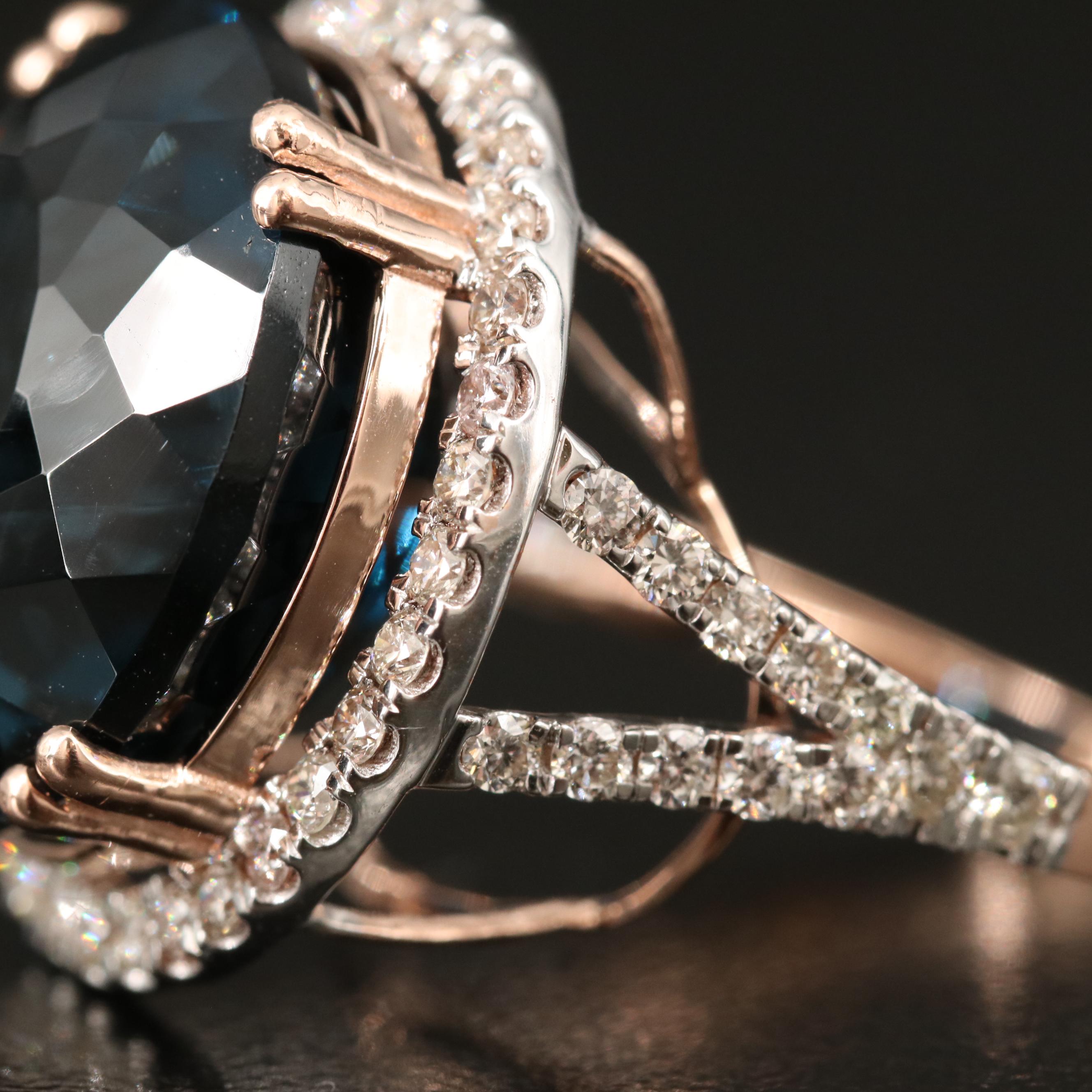 14K 26.70 CT London Blue Topaz and 1.05 CTW Diamond Cathedral Set Ring