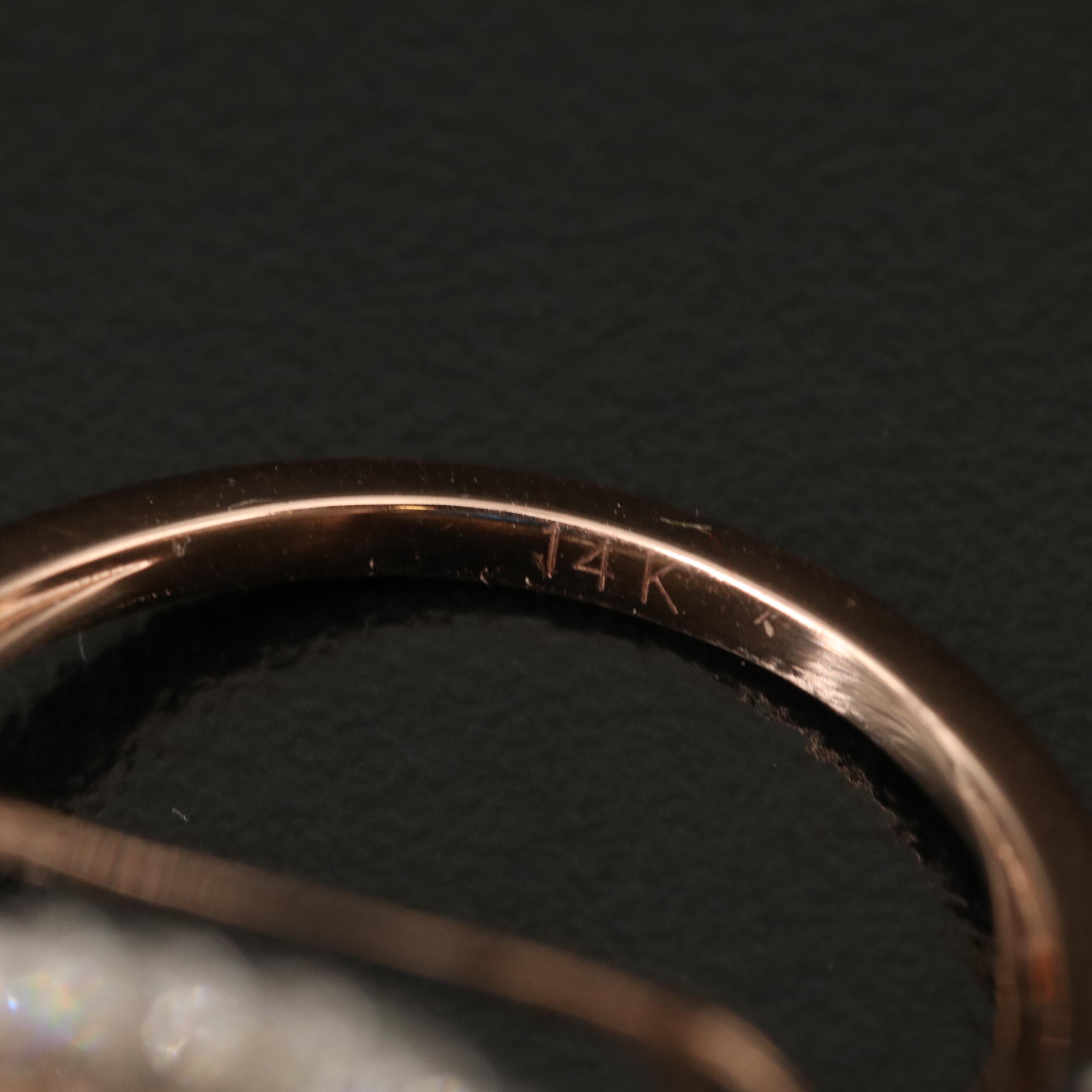 14K 26.70 CT London Blue Topaz and 1.05 CTW Diamond Cathedral Set Ring