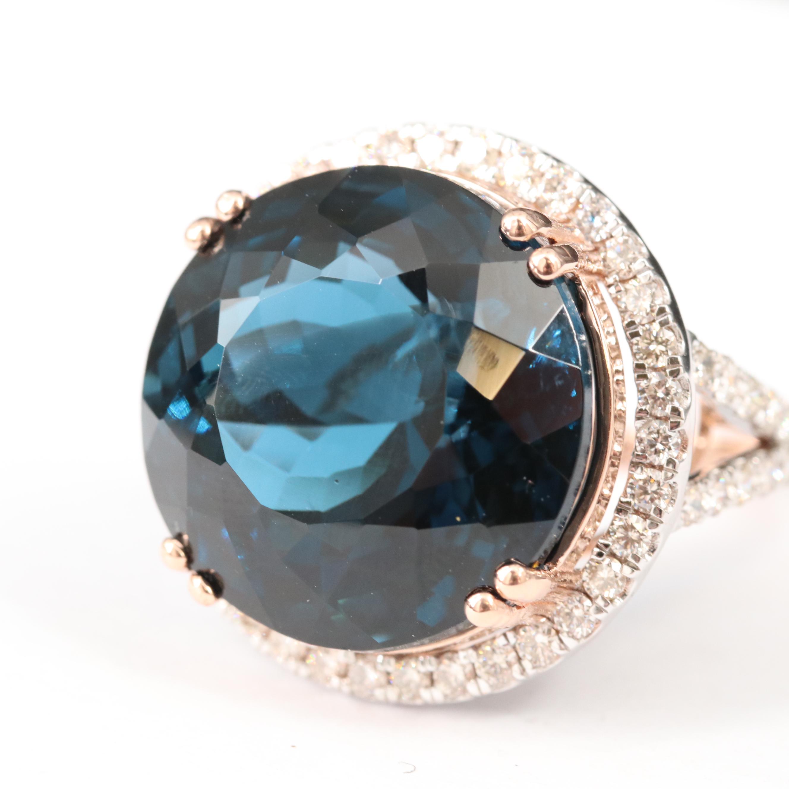 14K 26.70 CT London Blue Topaz and 1.05 CTW Diamond Cathedral Set Ring