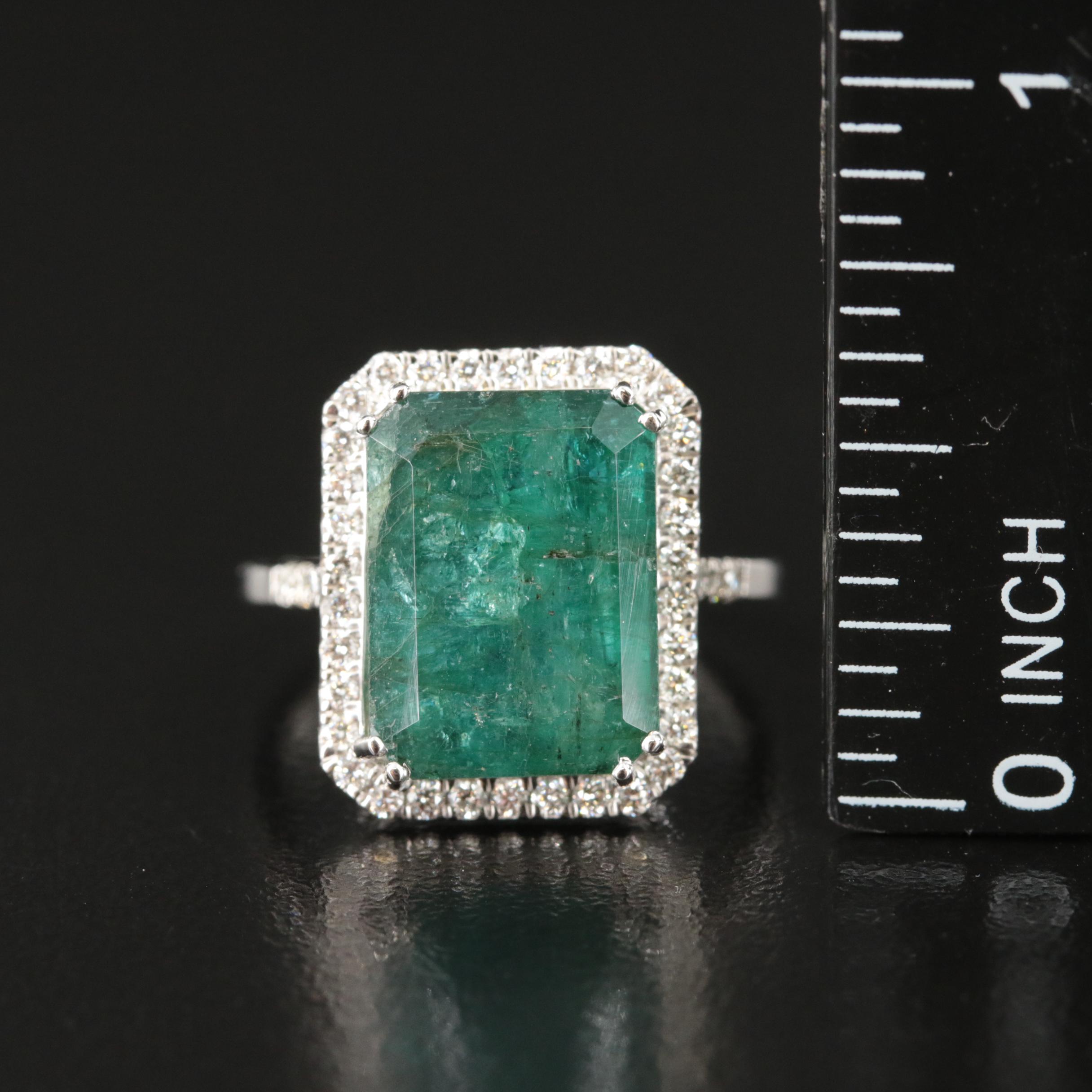 18K 7.94 CT Emerald and Diamond Halo Ring