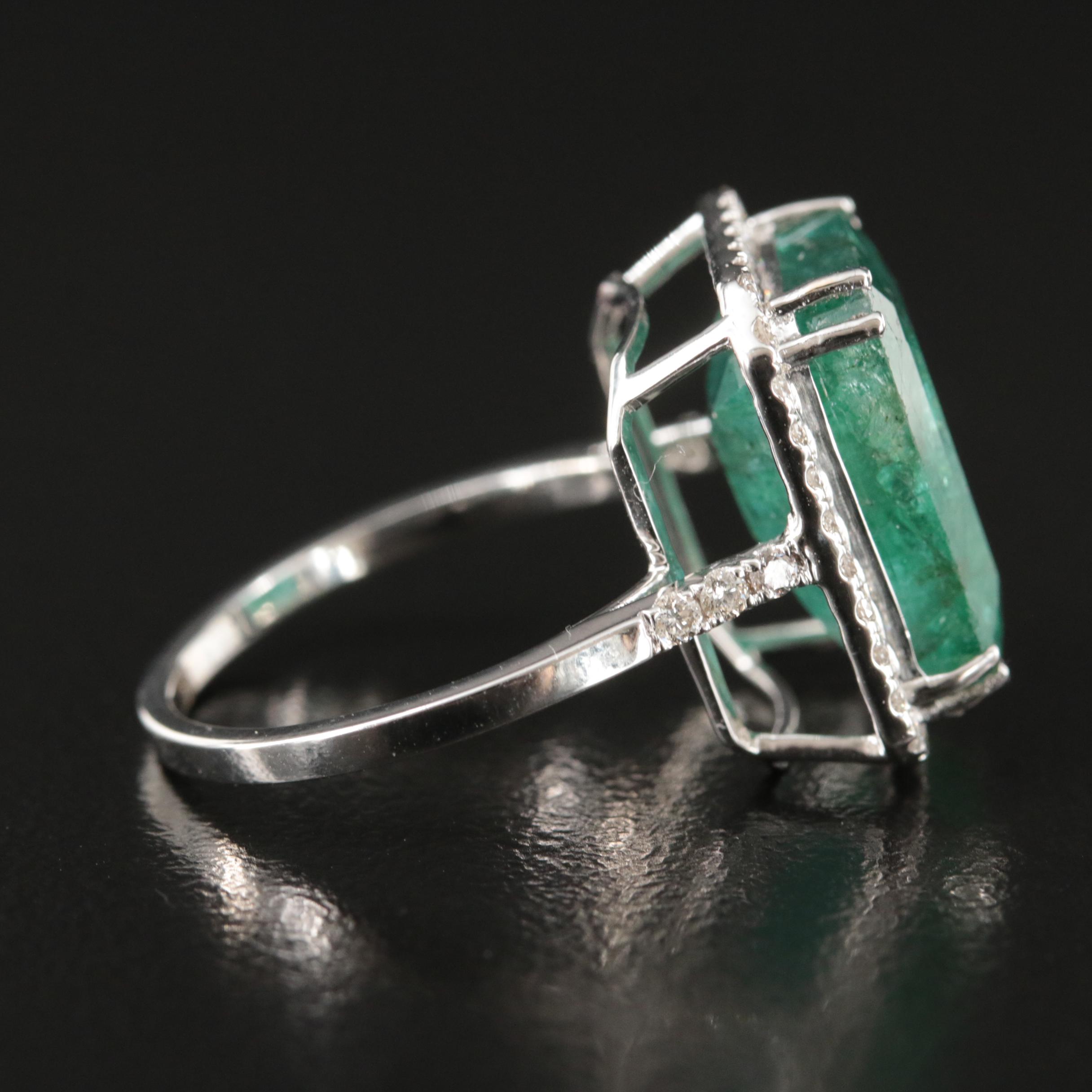18K 7.94 CT Emerald and Diamond Halo Ring