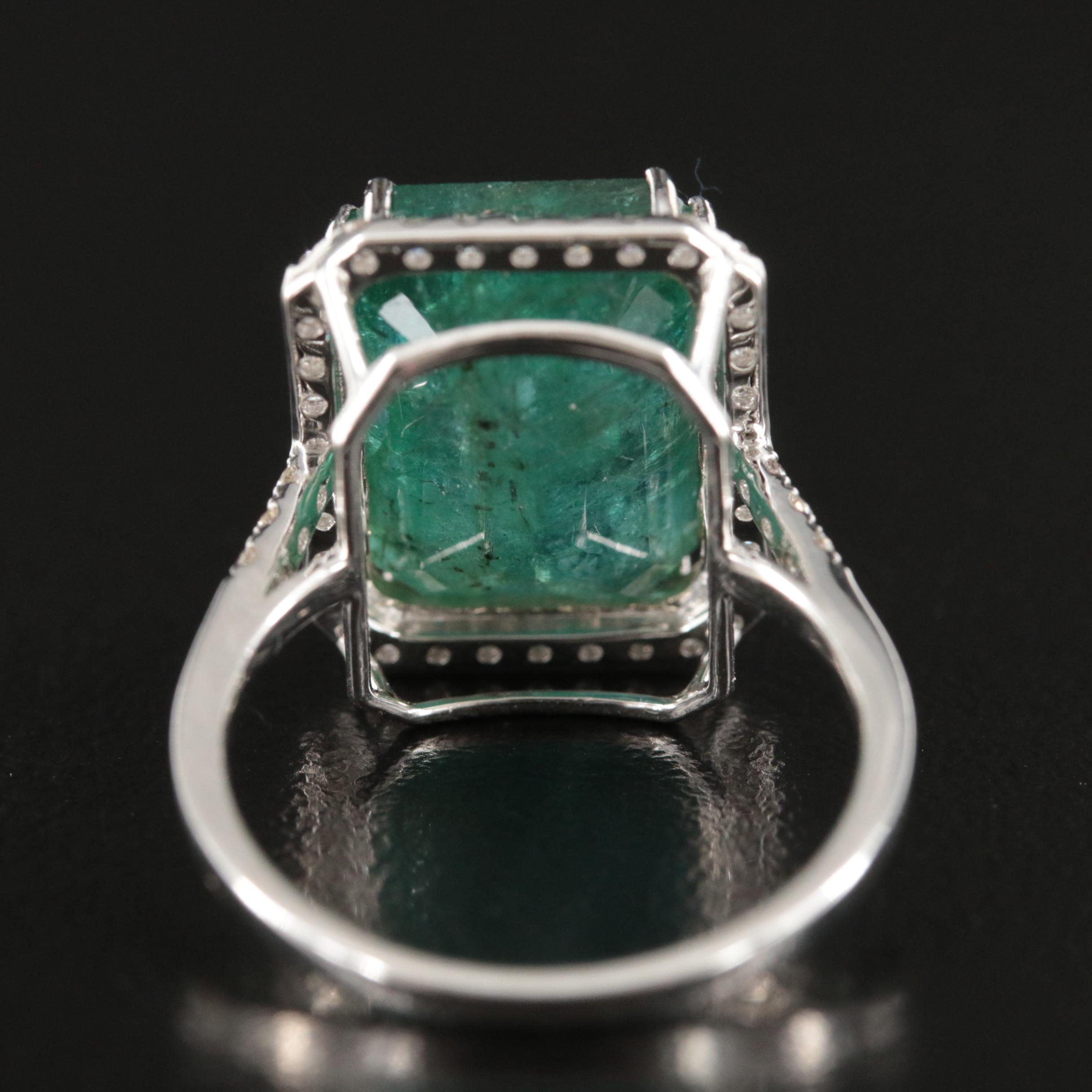 18K 7.94 CT Emerald and Diamond Halo Ring
