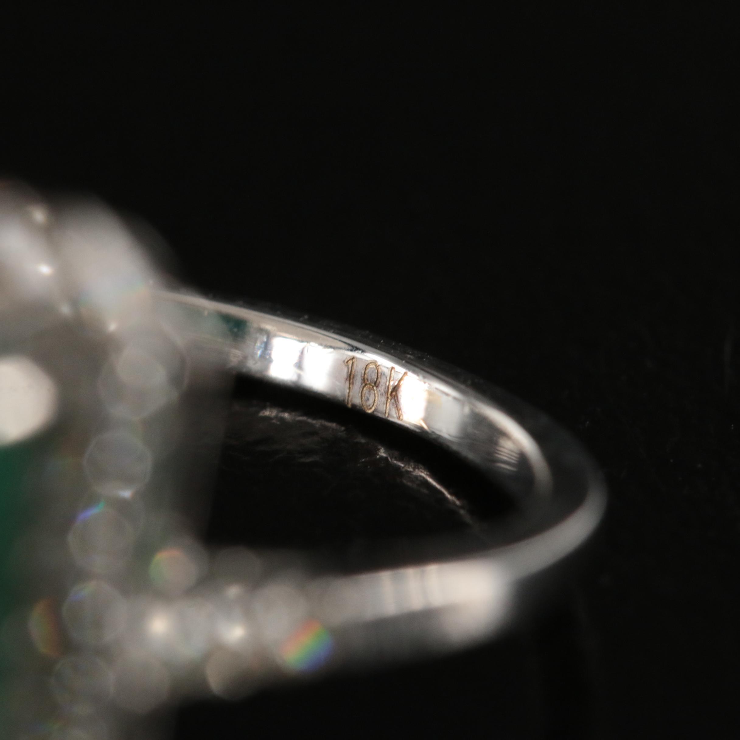 18K 7.94 CT Emerald and Diamond Halo Ring