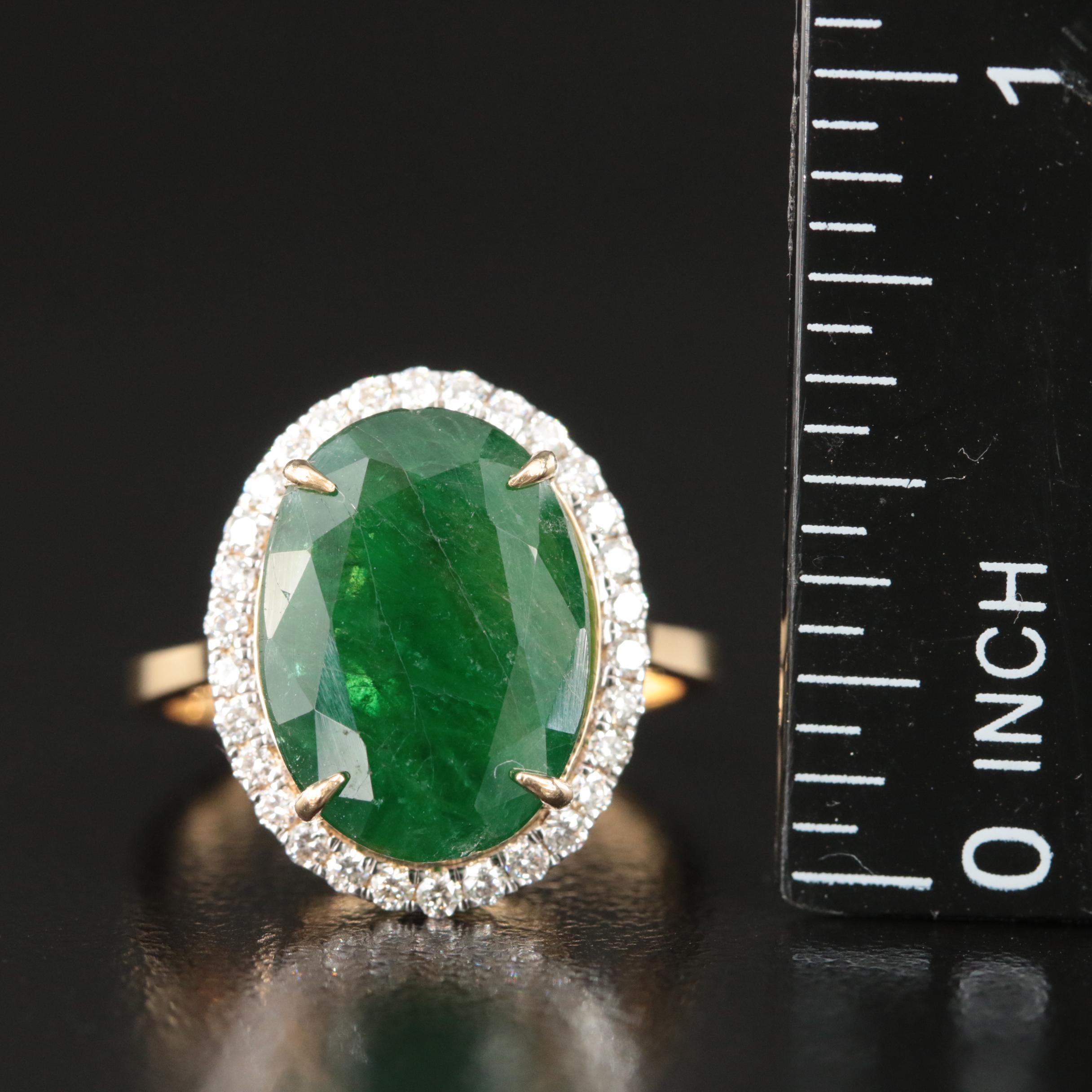 18K 5.56 CT Emerald and Diamond Halo Ring