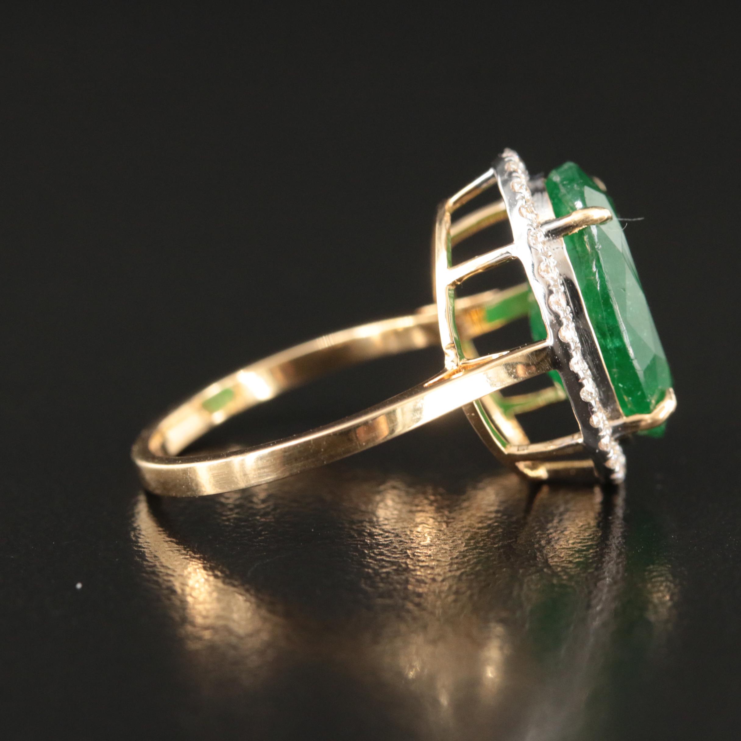 18K 5.56 CT Emerald and Diamond Halo Ring