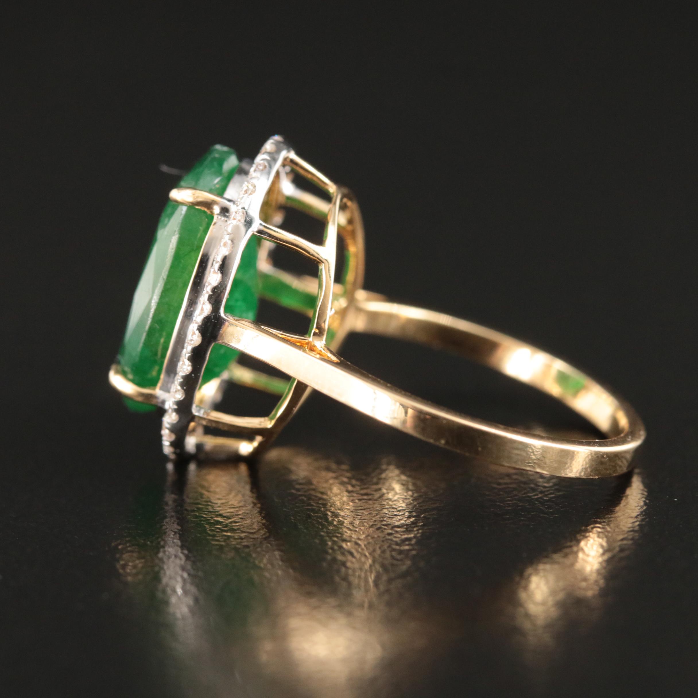 18K 5.56 CT Emerald and Diamond Halo Ring