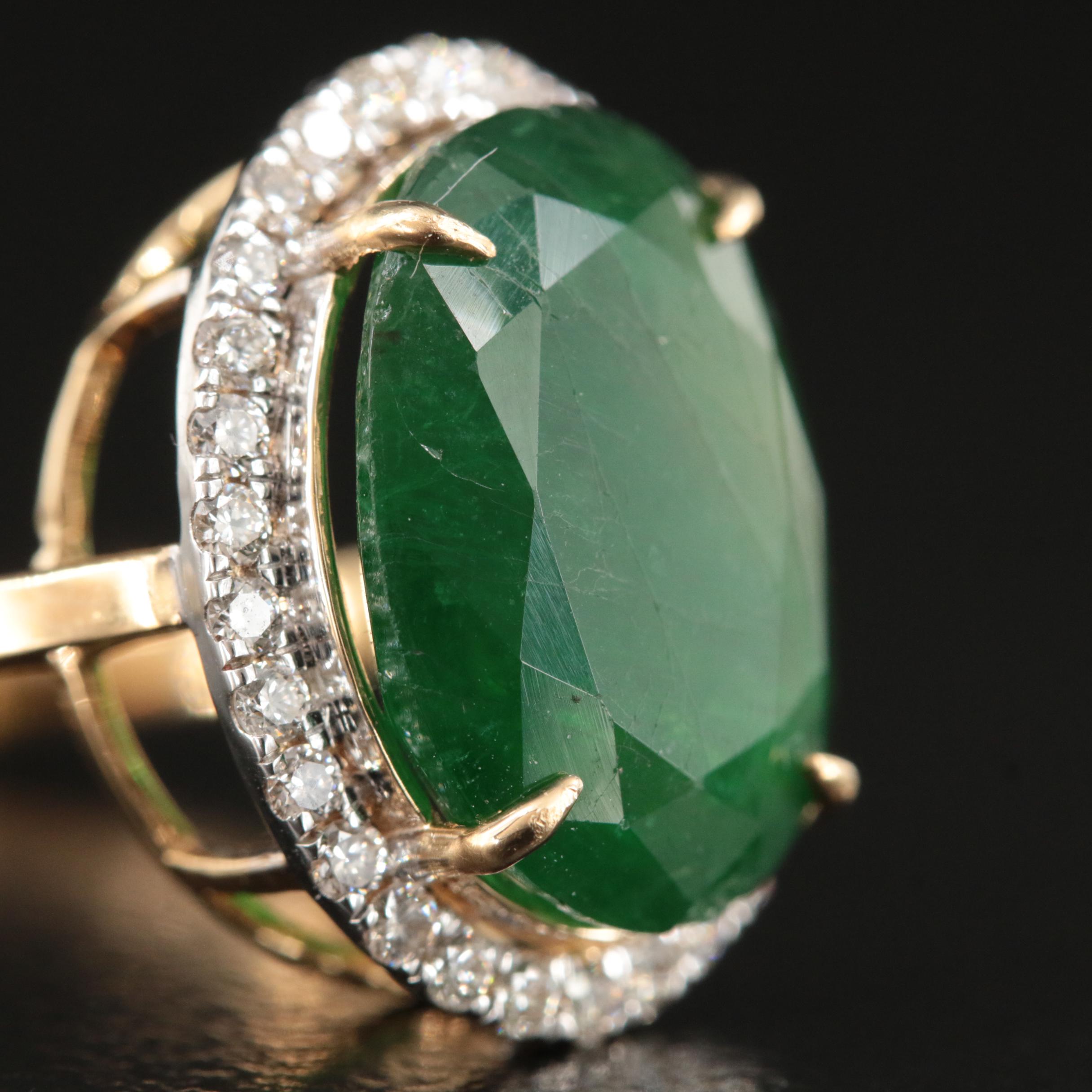 18K 5.56 CT Emerald and Diamond Halo Ring