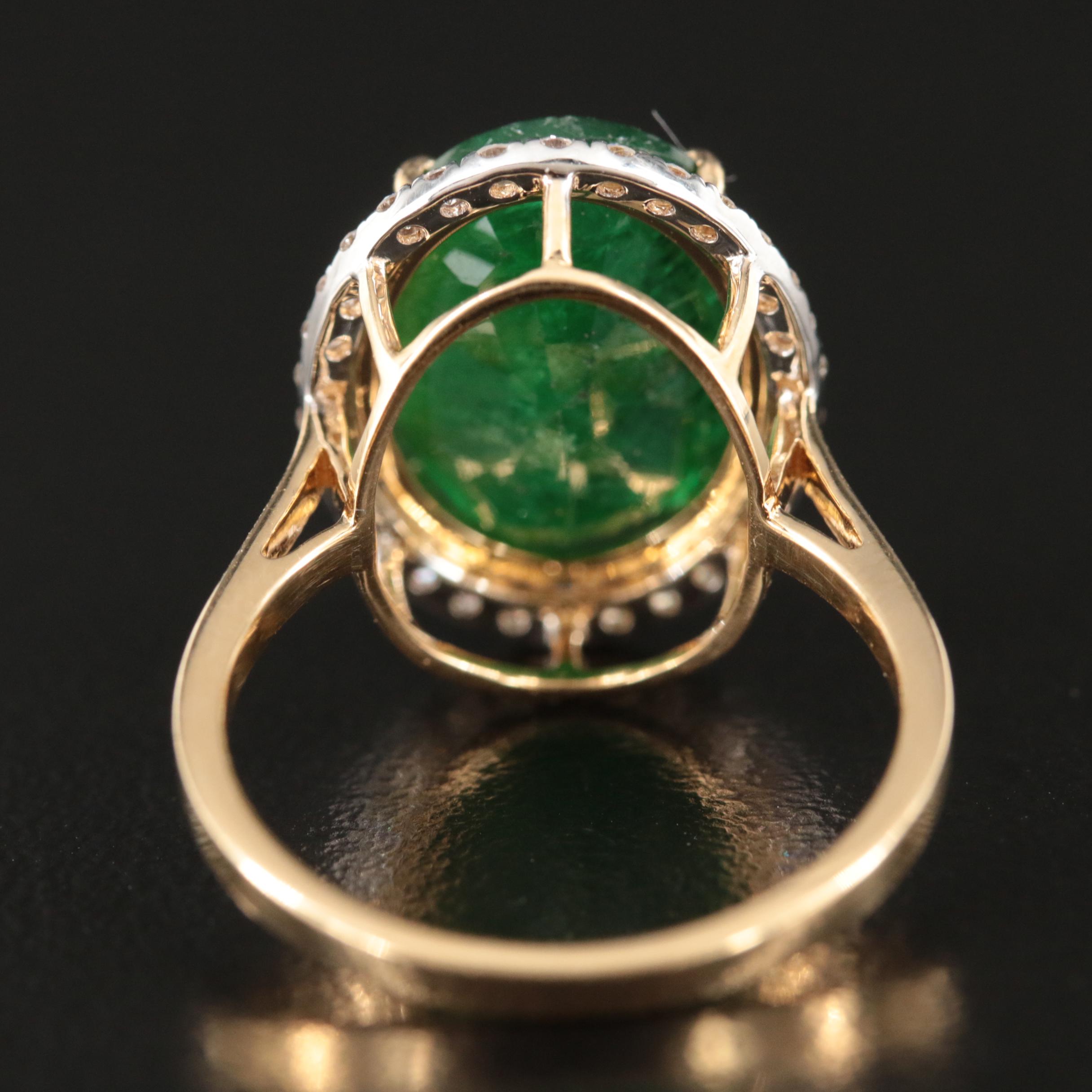 18K 5.56 CT Emerald and Diamond Halo Ring