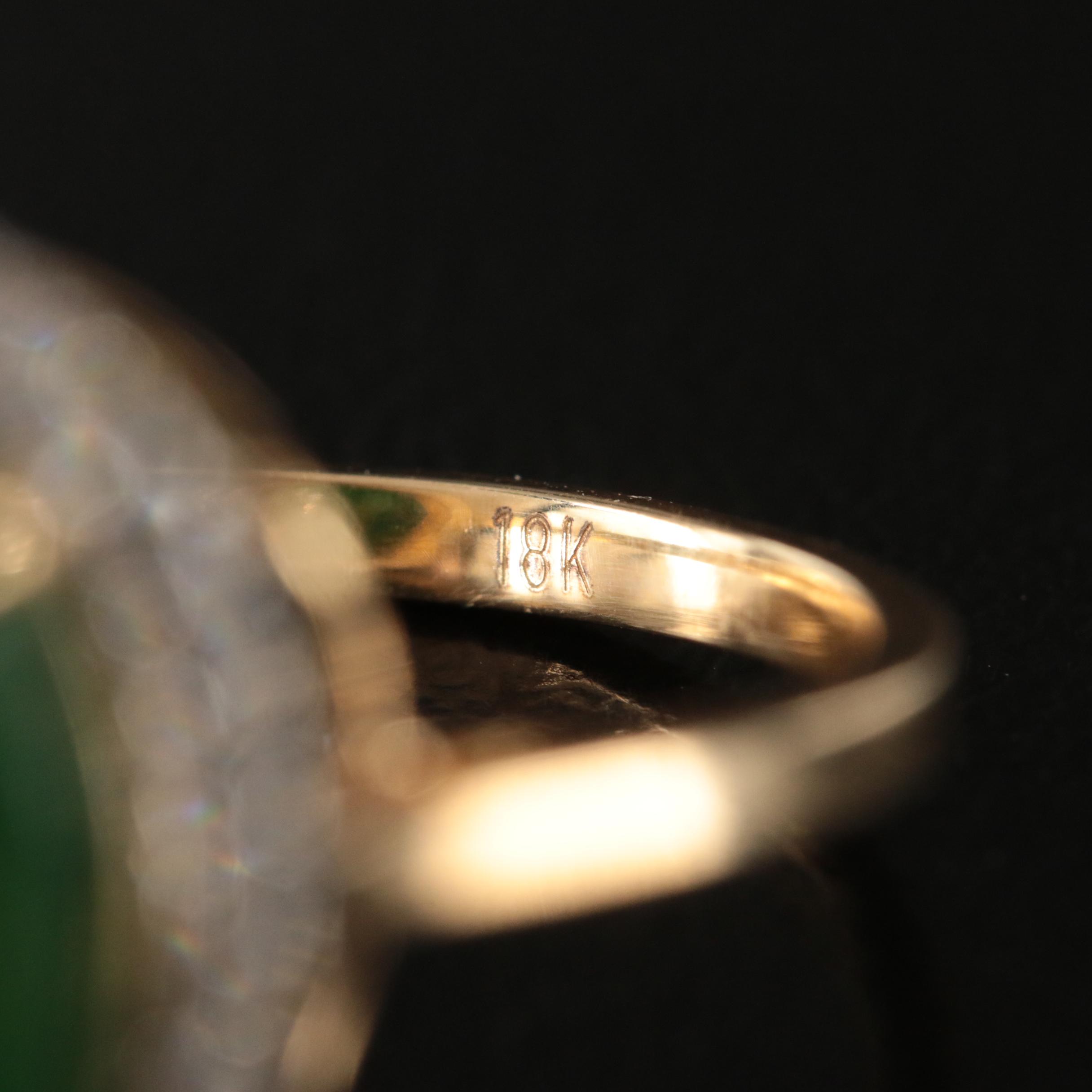 18K 5.56 CT Emerald and Diamond Halo Ring