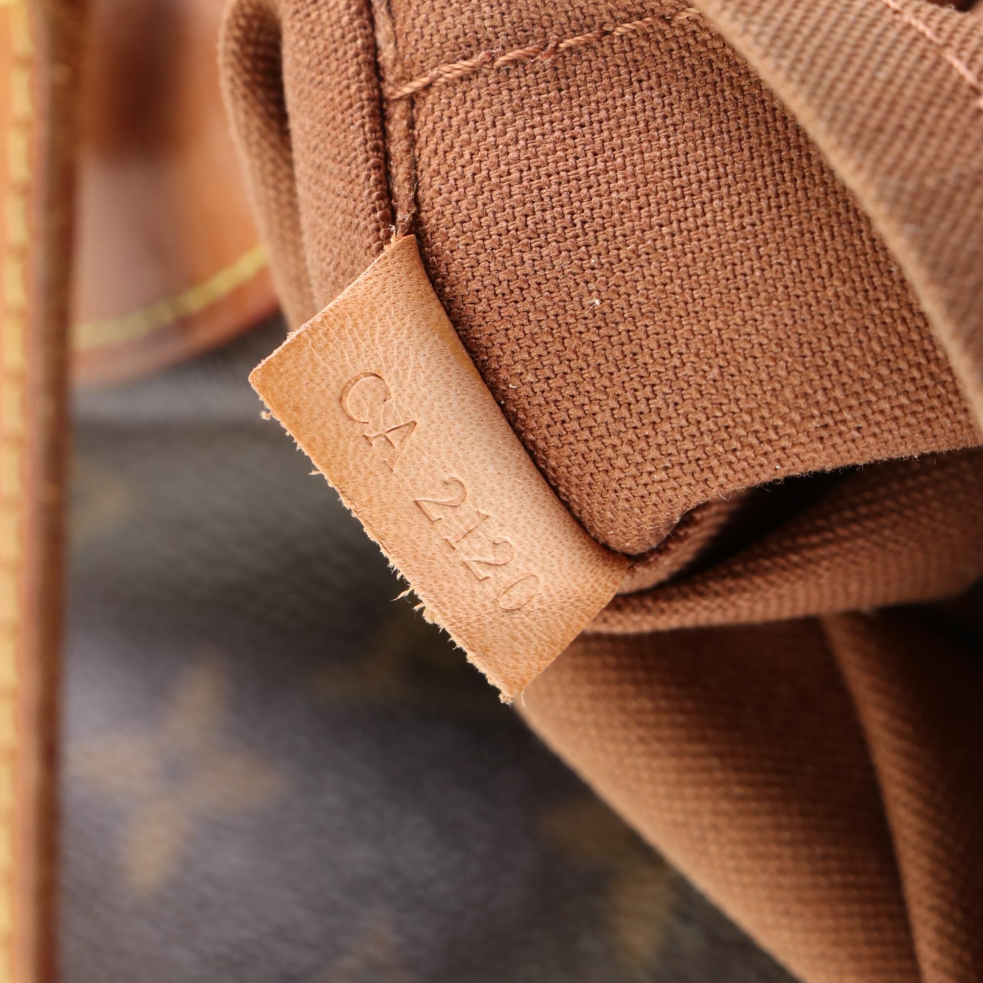 Louis Vuitton Odeon Bag in Monogram Canvas and Vachetta Leather