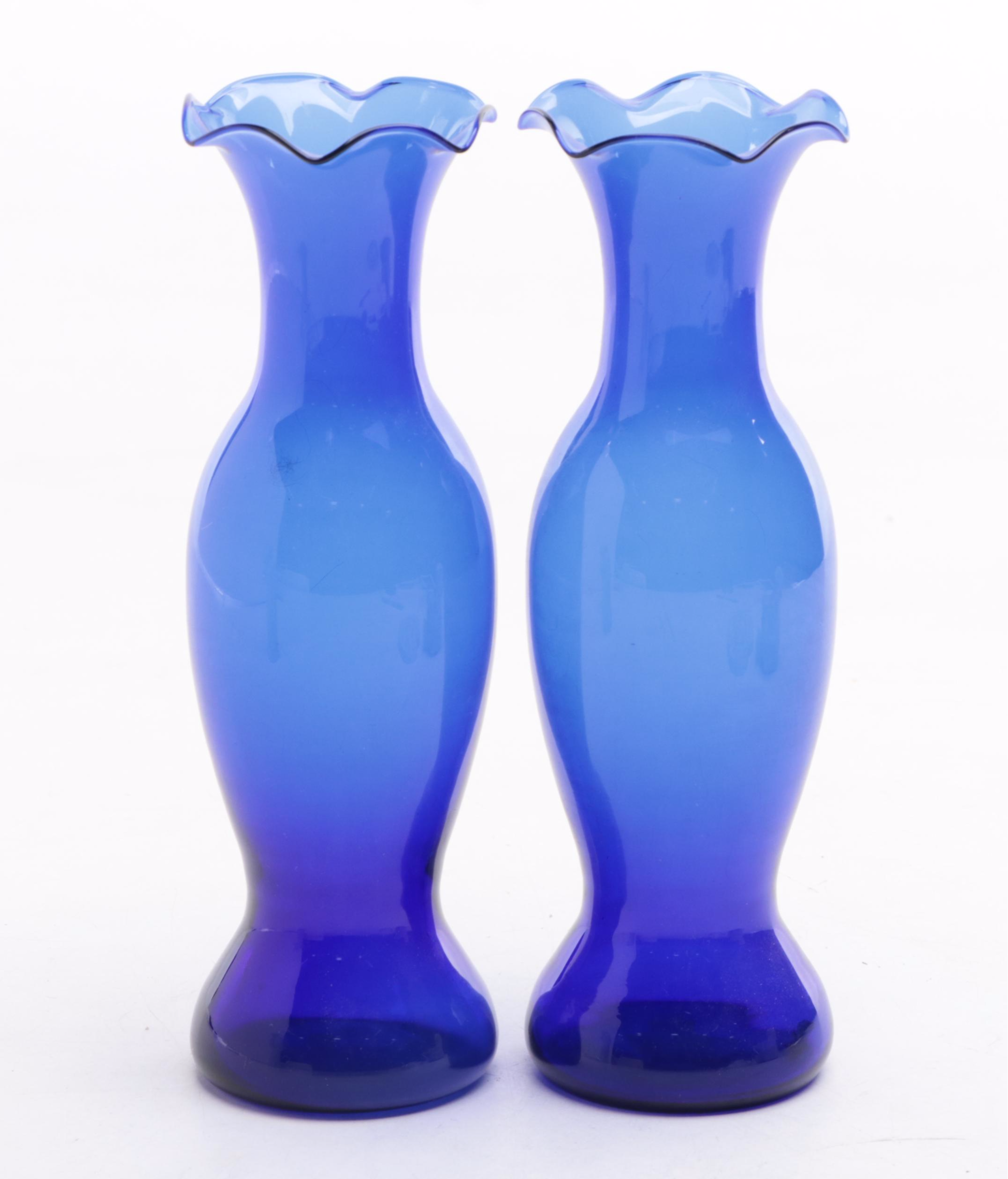 Isabel Bloom Painted Concrete Figurines with Cobalt Glass Vases