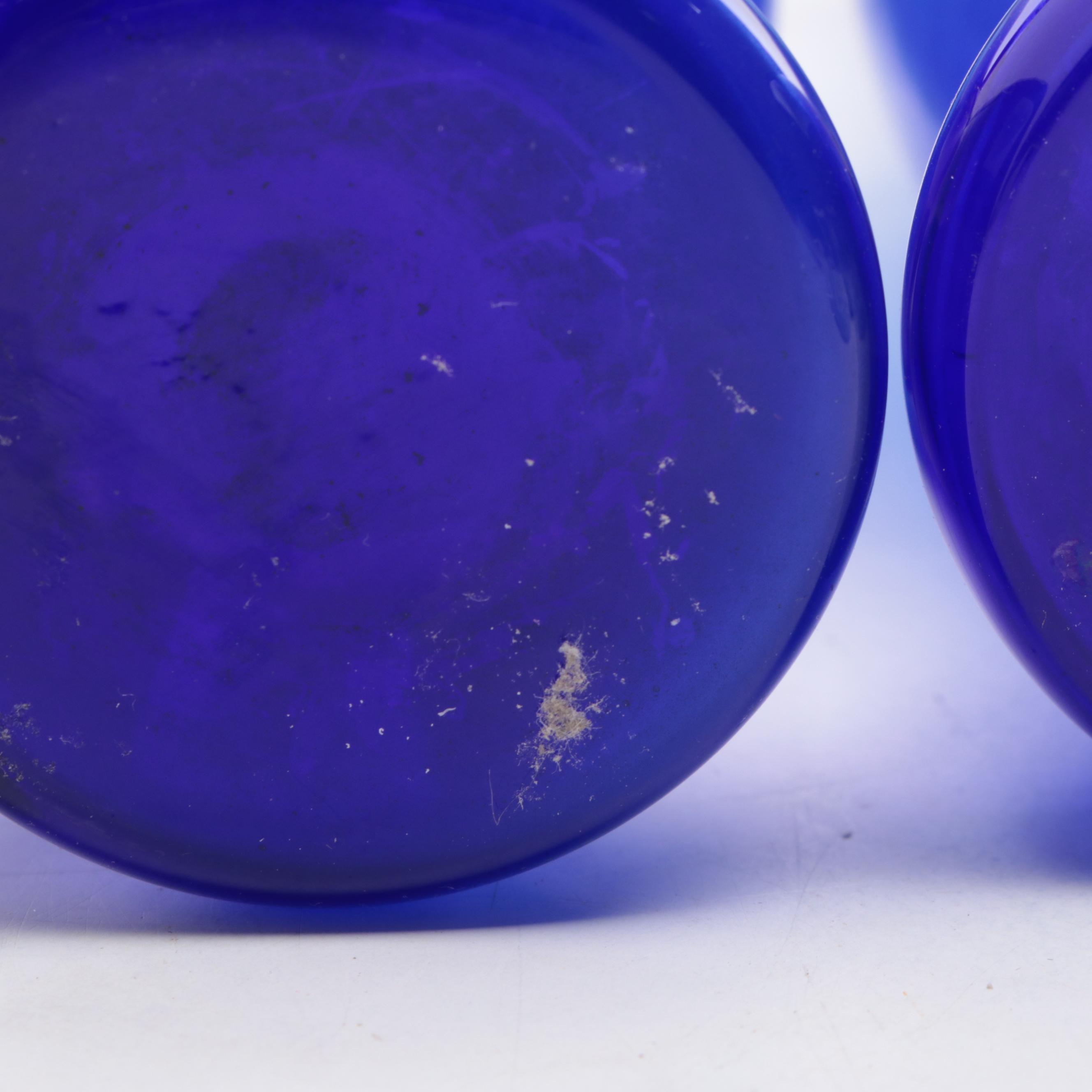 Isabel Bloom Painted Concrete Figurines with Cobalt Glass Vases