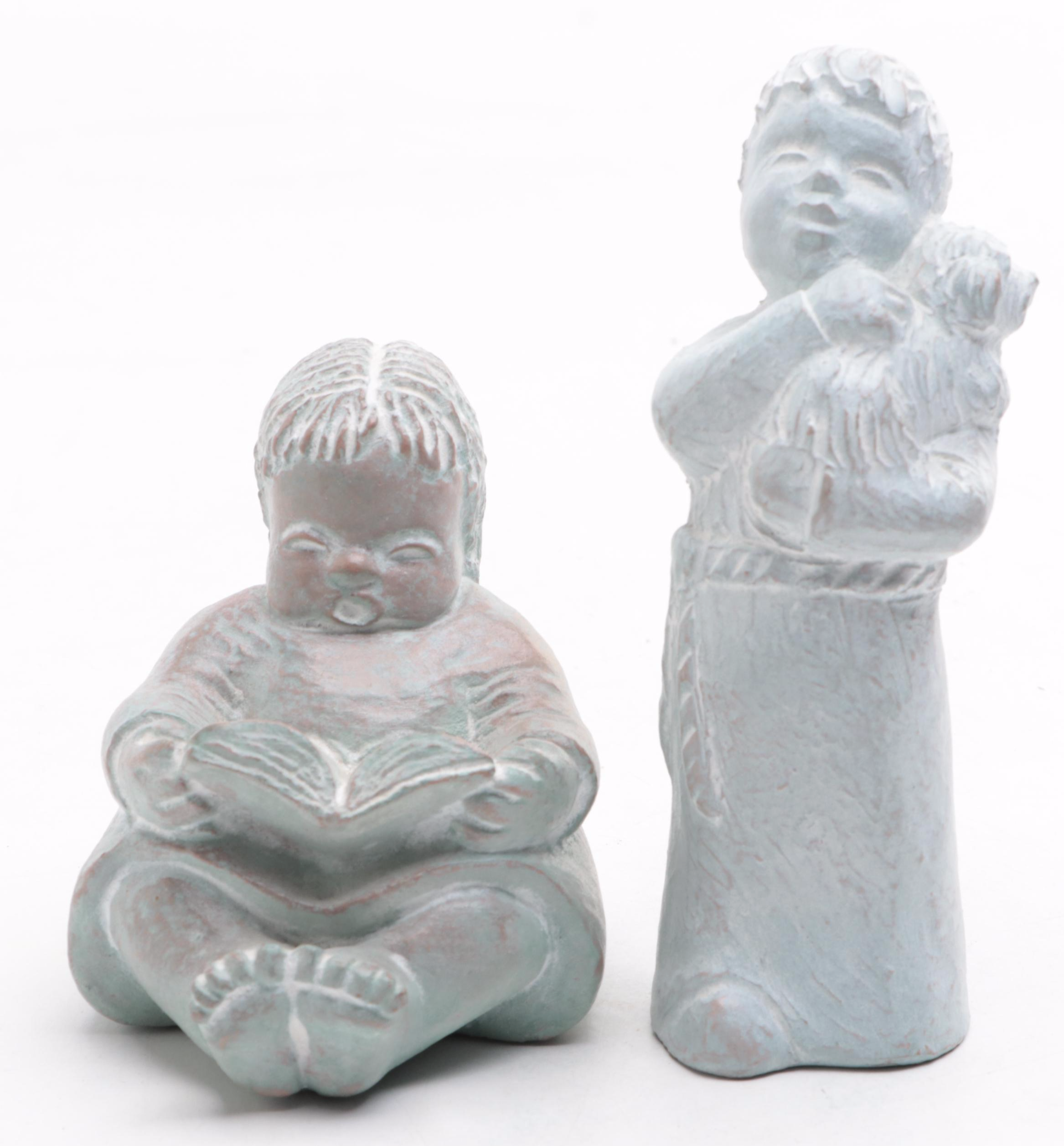 Isabel Bloom Painted Concrete Figurines with Cobalt Glass Vases