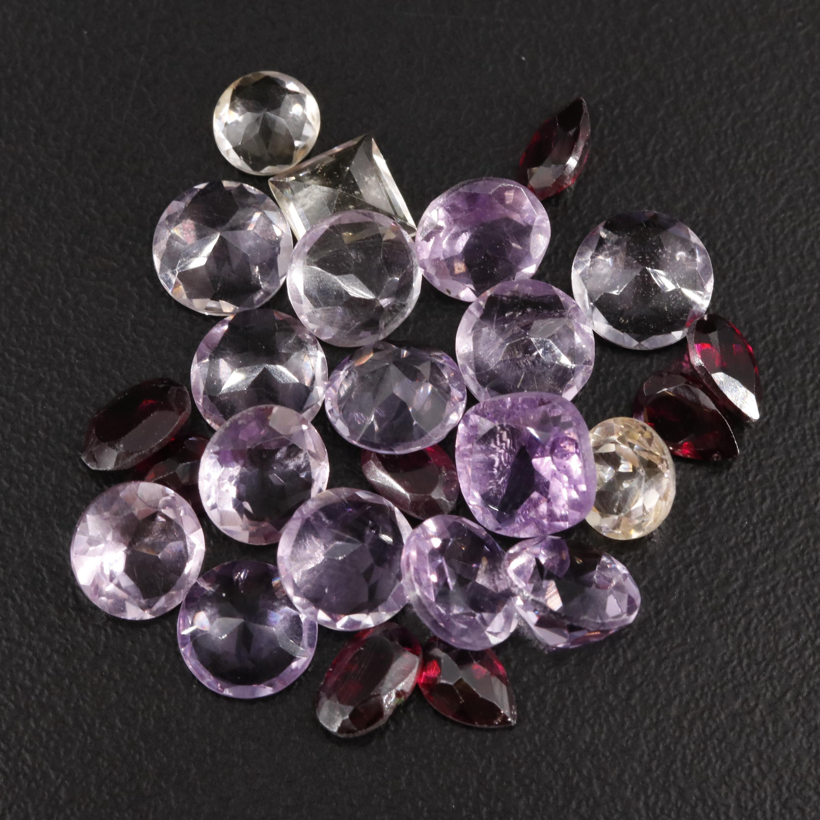 Loose 22.95 CTW Amethyst, Citrine, and Garnet Lot