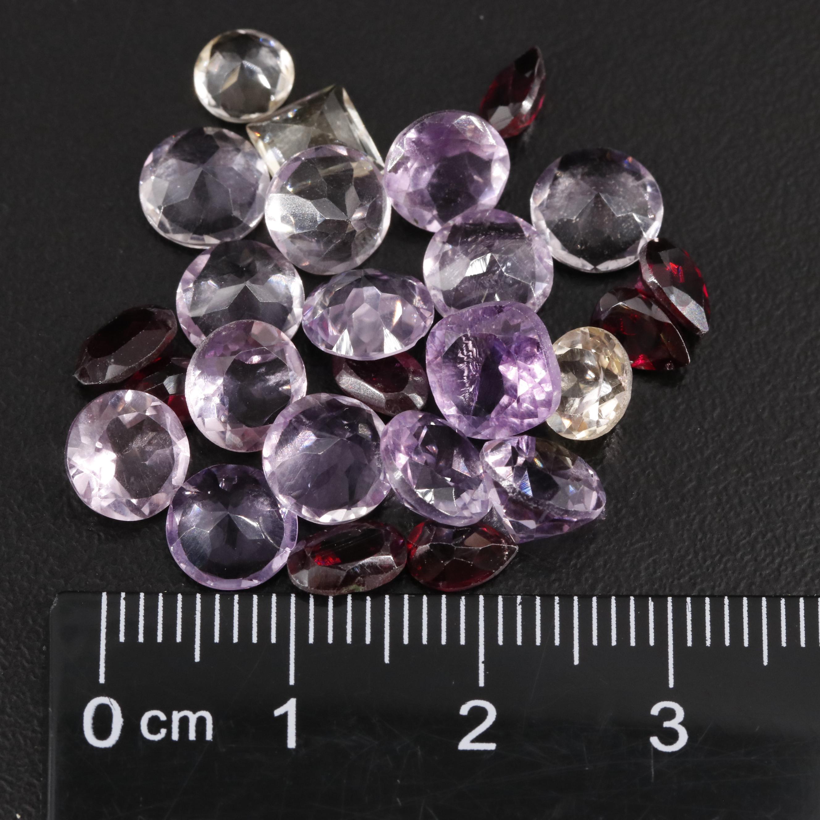 Loose 22.95 CTW Amethyst, Citrine, and Garnet Lot