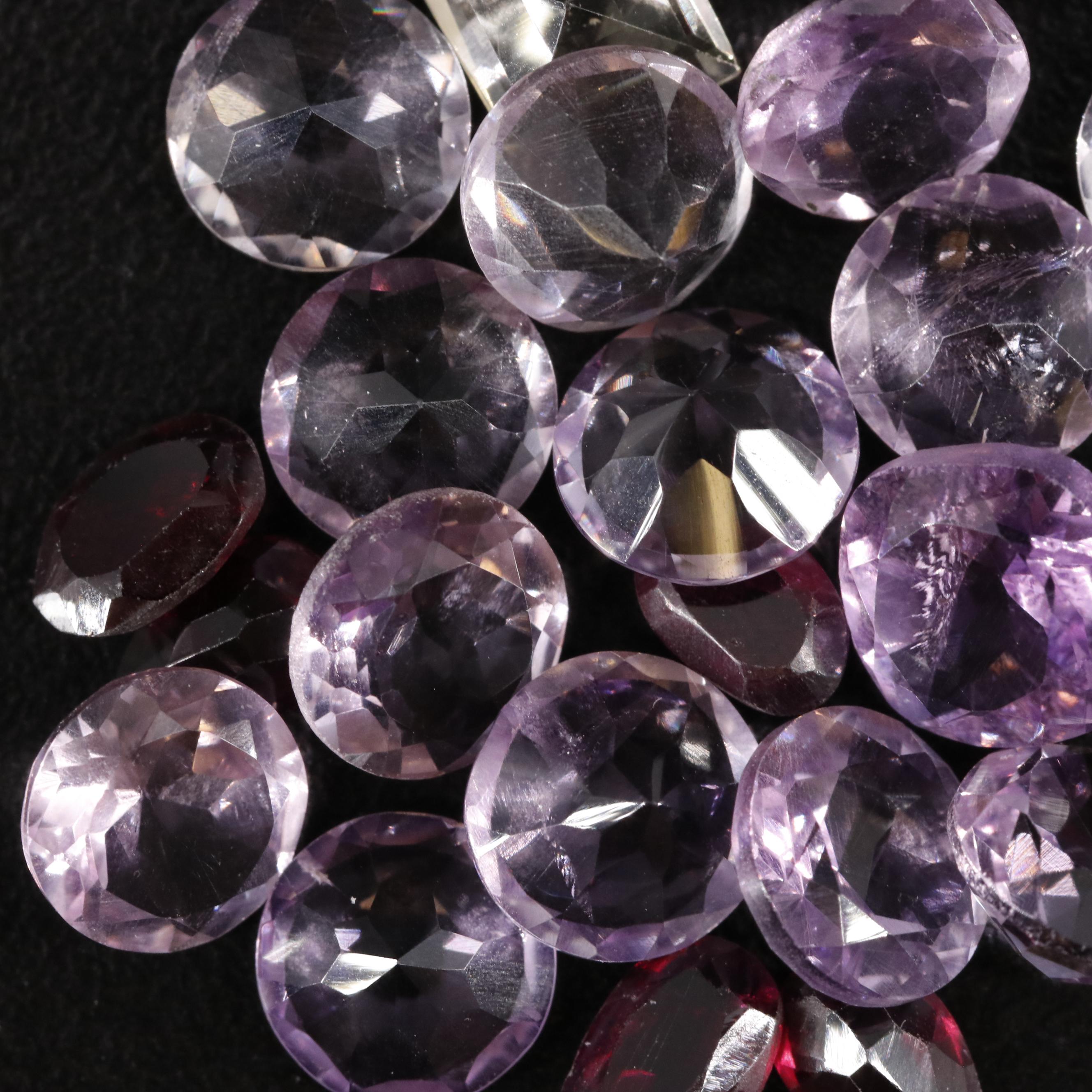 Loose 22.95 CTW Amethyst, Citrine, and Garnet Lot