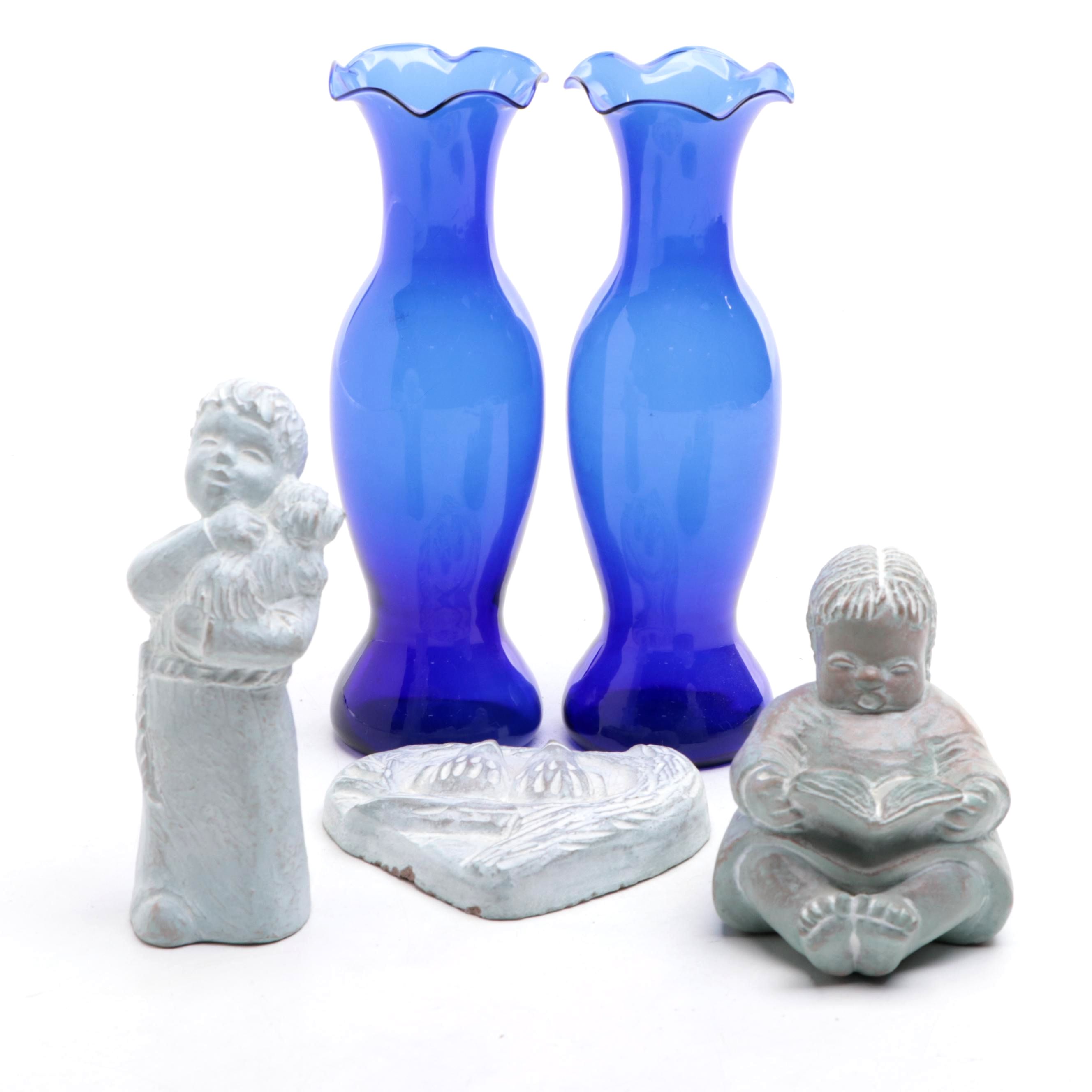Isabel Bloom Painted Concrete Figurines with Cobalt Glass Vases