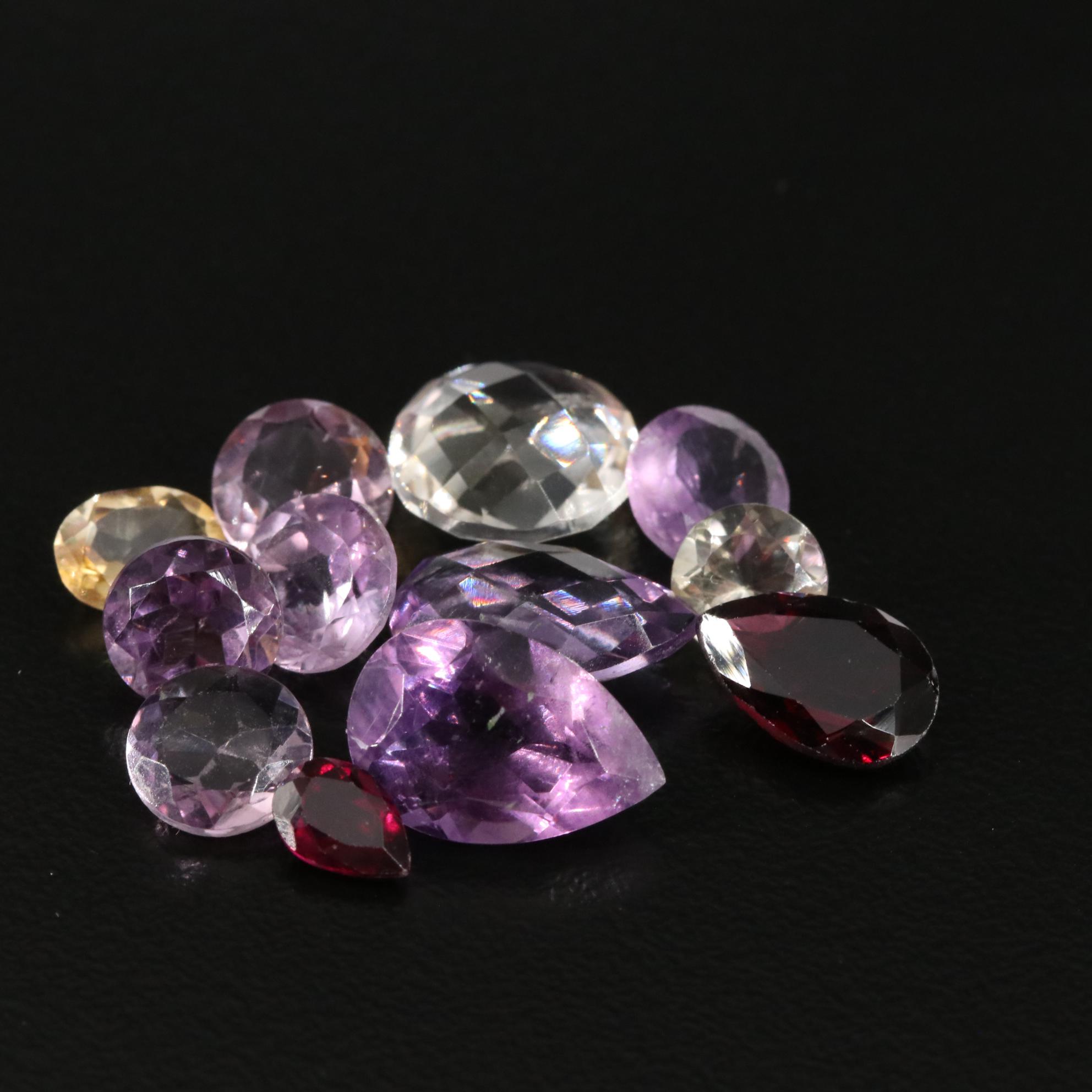 Loose 18.45 CTW Amethyst, Citrine, and Garnet Lot