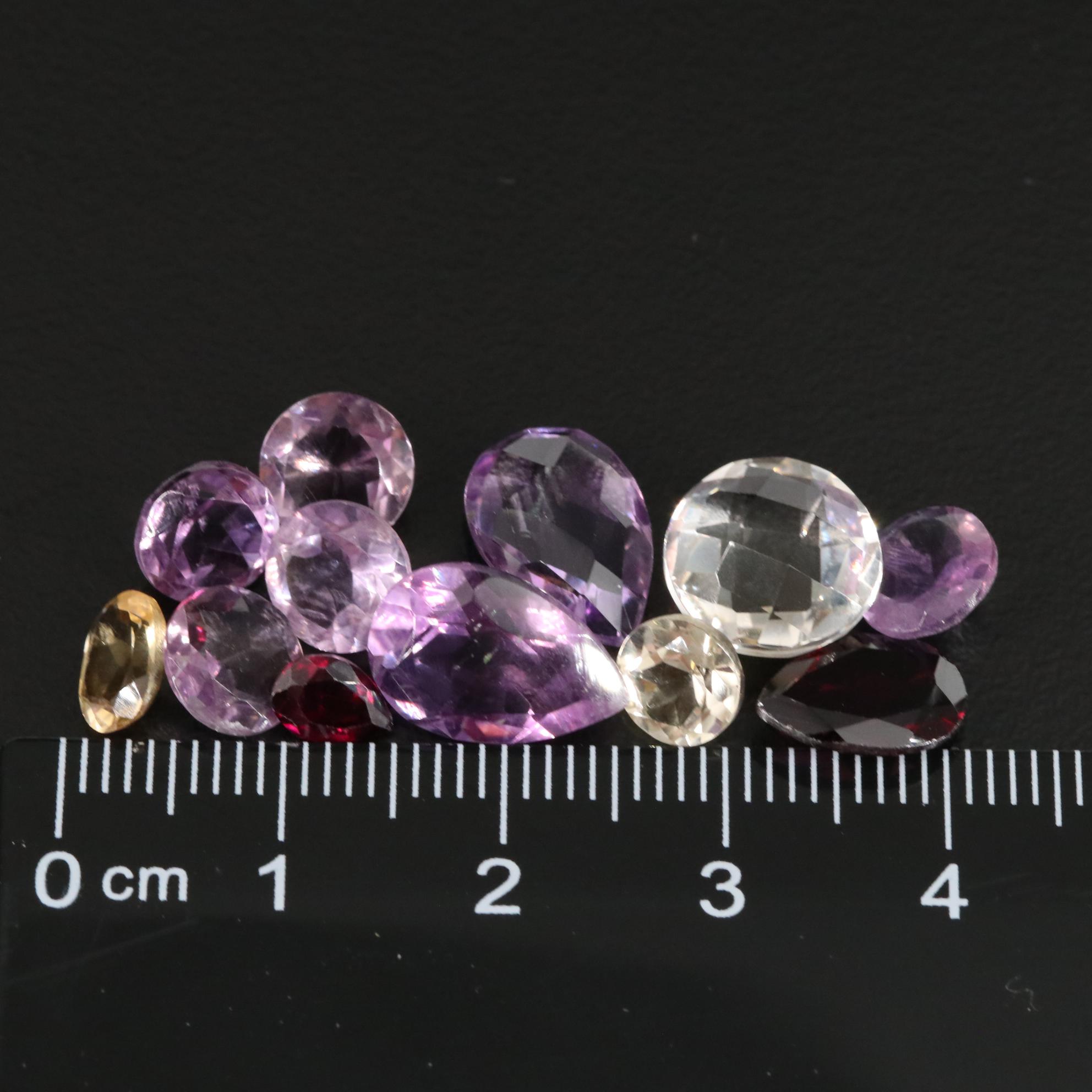 Loose 18.45 CTW Amethyst, Citrine, and Garnet Lot