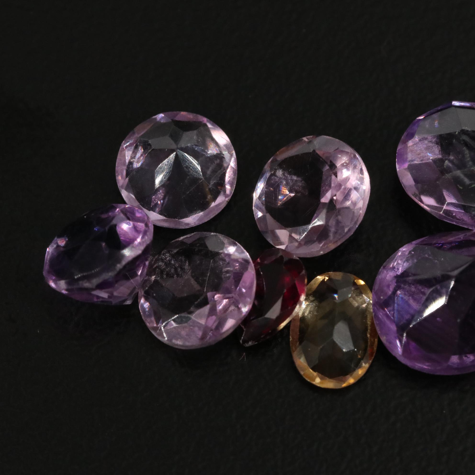 Loose 18.45 CTW Amethyst, Citrine, and Garnet Lot