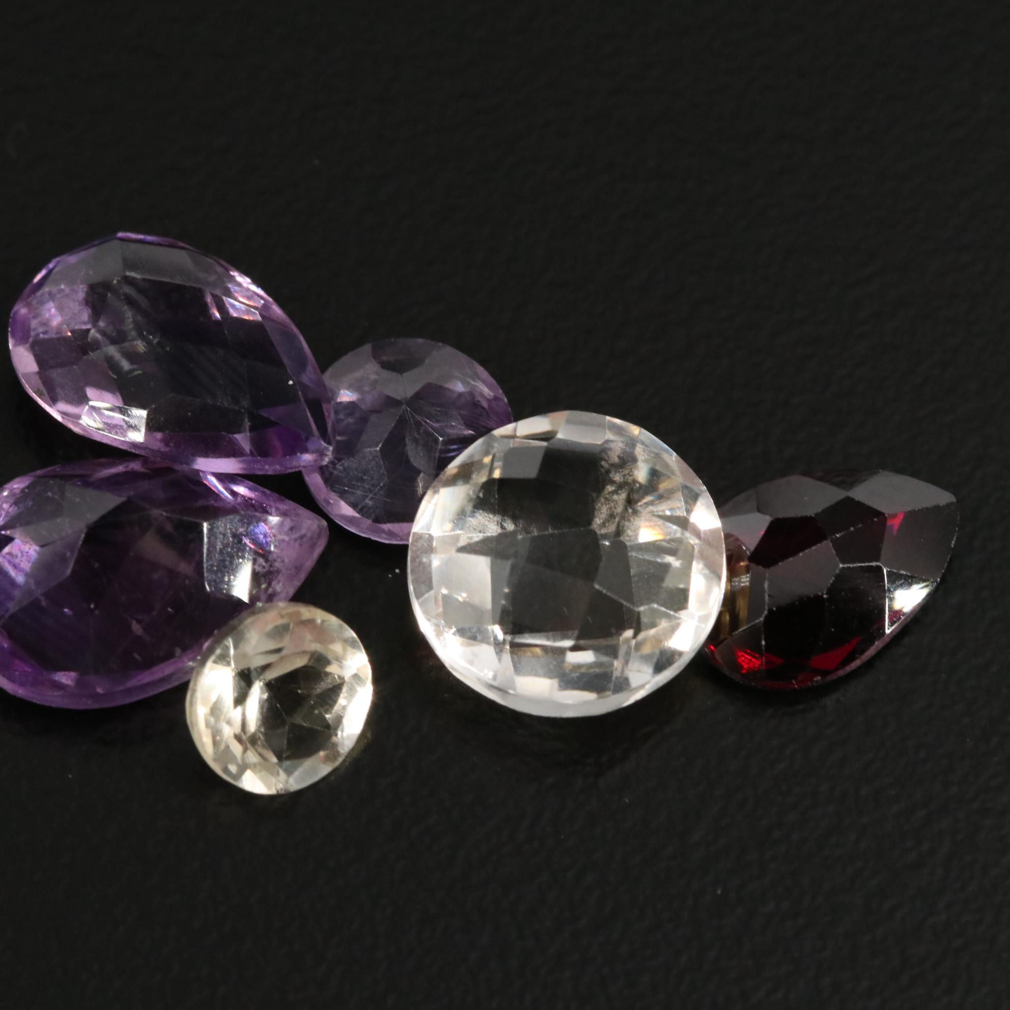 Loose 18.45 CTW Amethyst, Citrine, and Garnet Lot