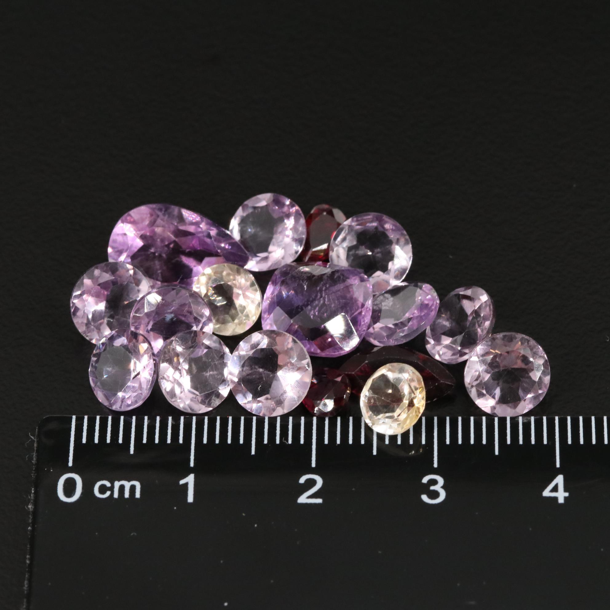 Loose 20.42 CTW Amethyst, Citrine, and Garnet Lot