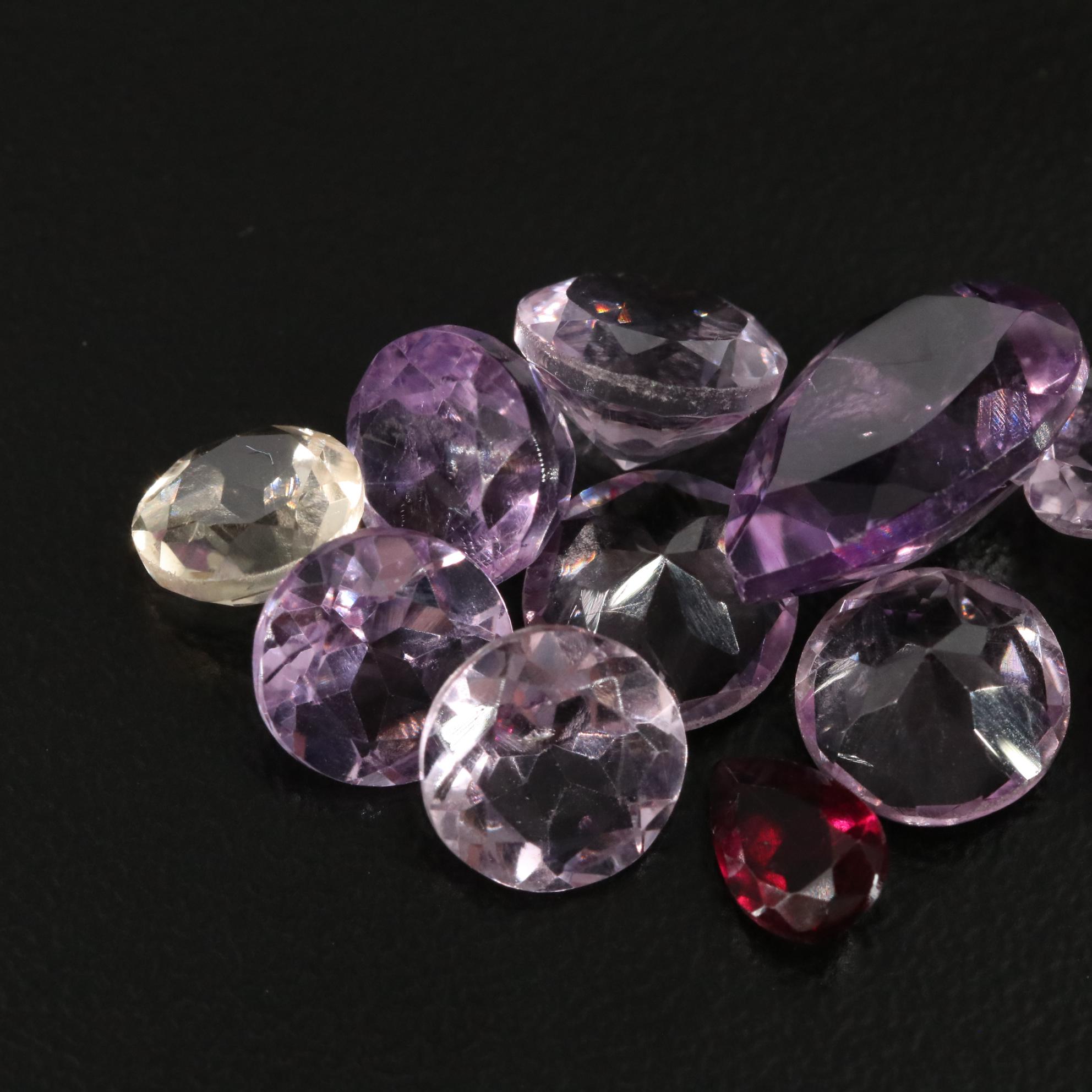 Loose 20.42 CTW Amethyst, Citrine, and Garnet Lot